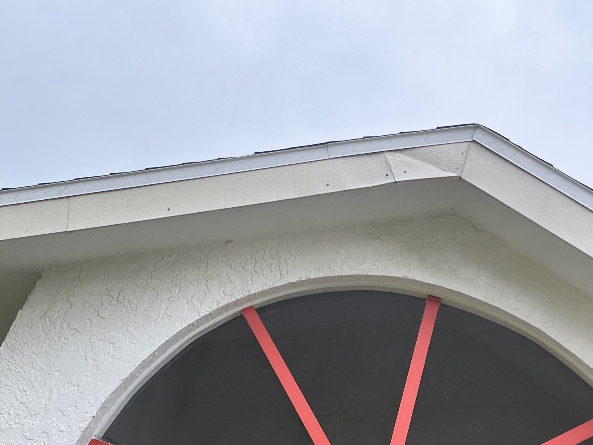 White Seamless Gutters with Splash Guards in North Fort Myers FL by Gutter Professor   by Gutter Professors