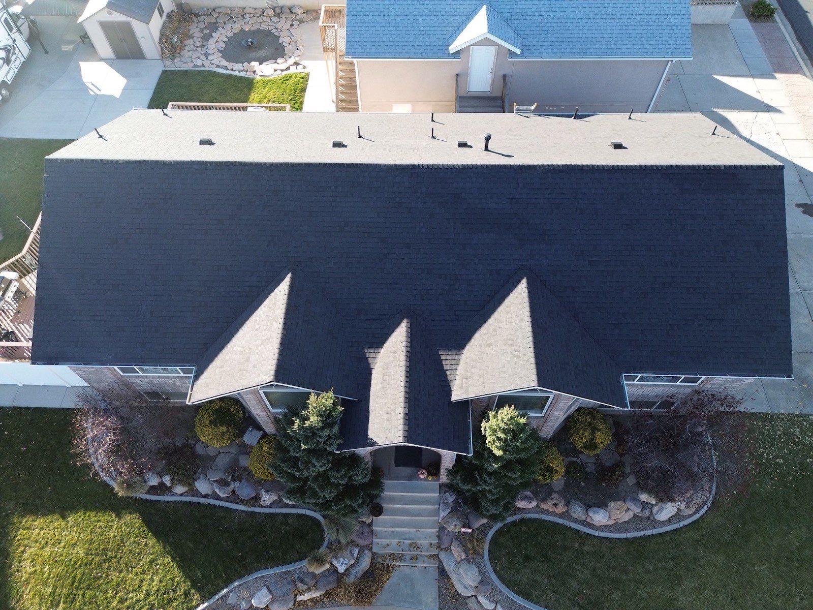Onyx Black Shingles by Reimagine Roofing