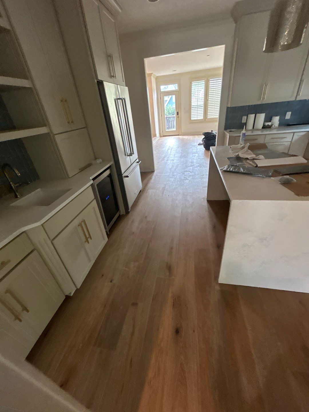 White Oak Hardwood and Checkerboard Tile Installation by Footprints Floors of Nashville
