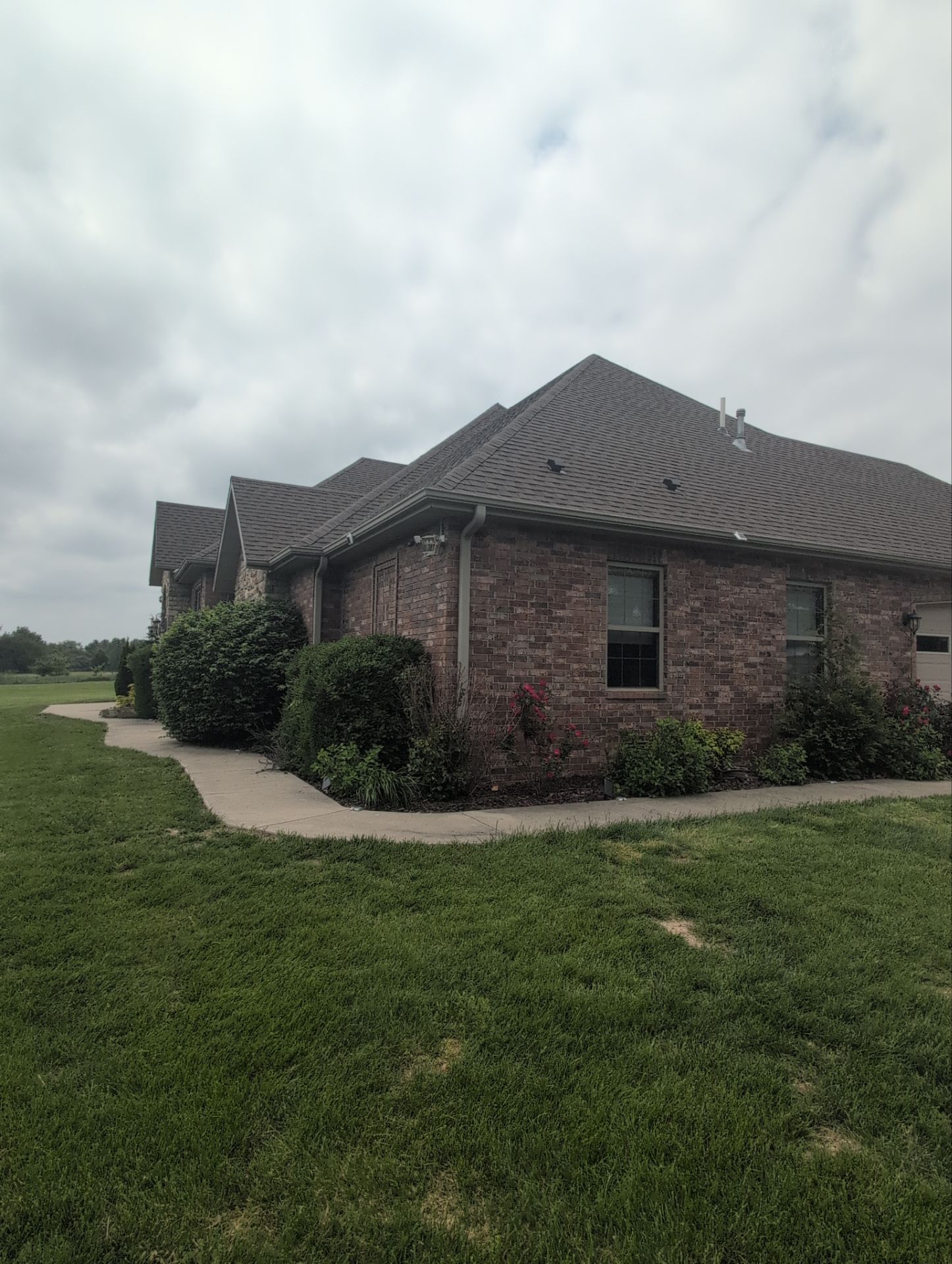 Roof Replacement & Seamless Gutters in Ozark by Table Rock Design + Build