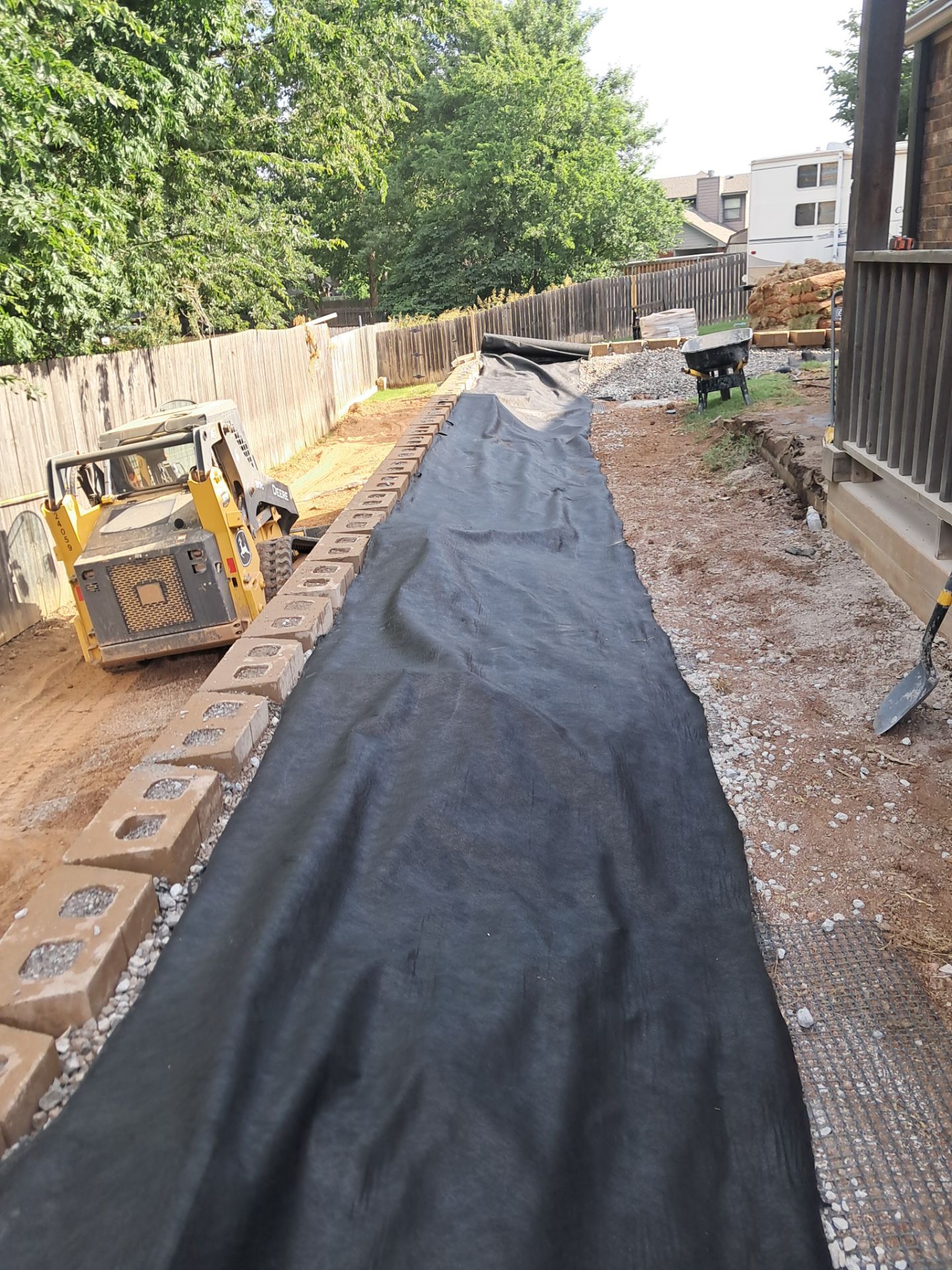 Custom Segmental Block Retaining Wall and Sod Installation in Lawton by Clays Services Inc