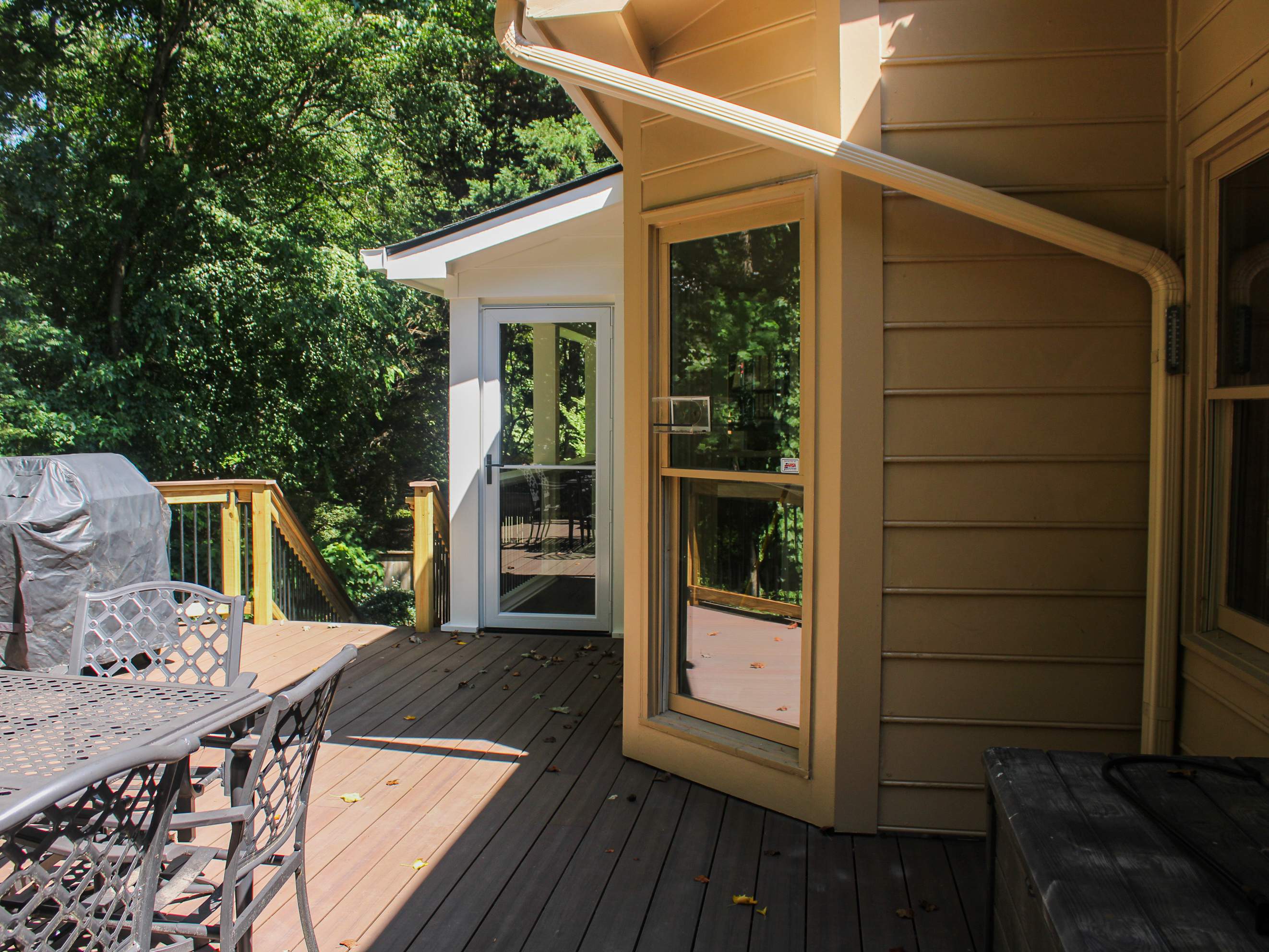 Deckorators Voyage Deck and Shed Style Covered Porch Build with Drink Rail by Nelson Exteriors 