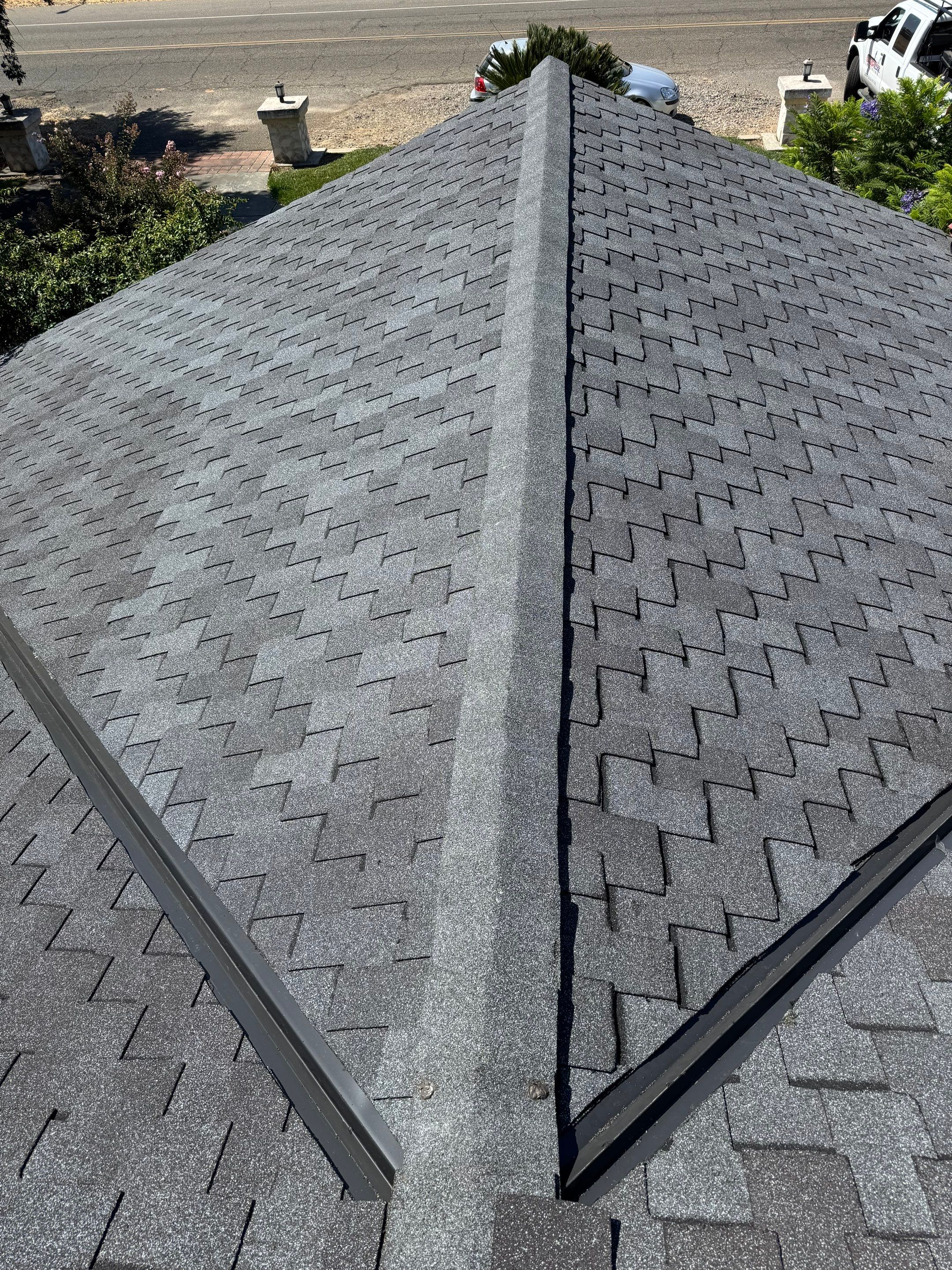 Presidential shingle roof by Straight Edge Roofing Inc