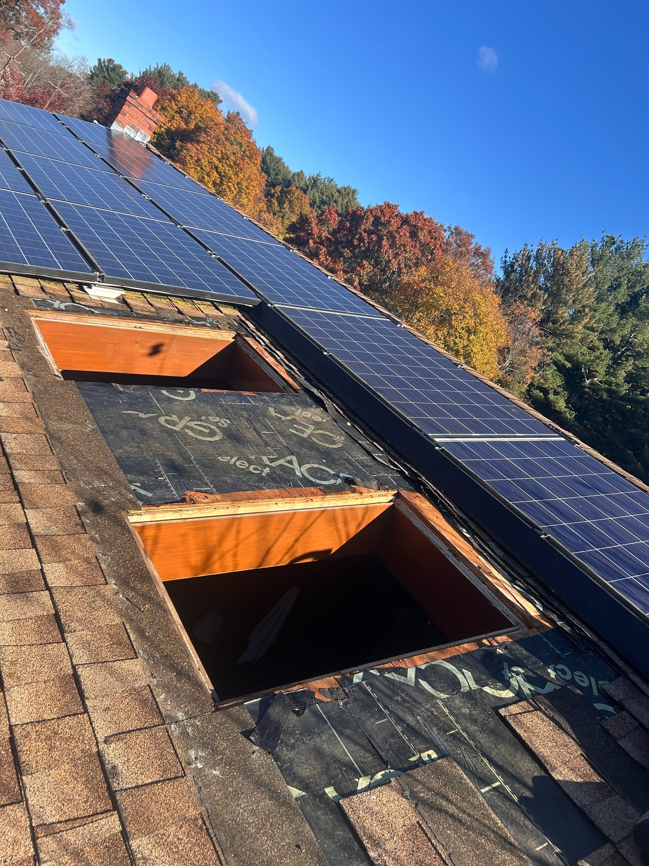 Tewksbury Dual Skylight Replacement with Solar Shades by Mighty Dog Roofing of Greater Middlesex County