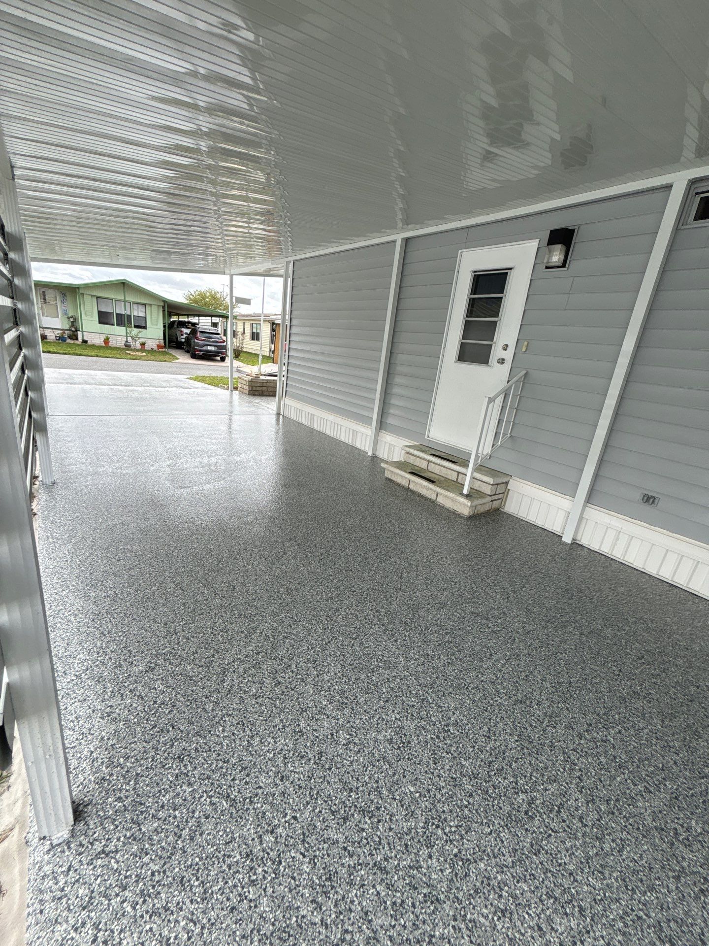 Driveway Floor Coating Using Gravel Flake by Performance Floors & Coating