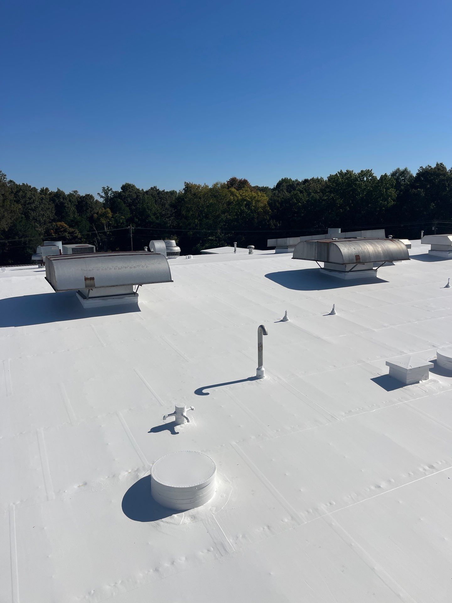 Commercial Roofing Installation using Coatings by Kentucky Commercial Roofing