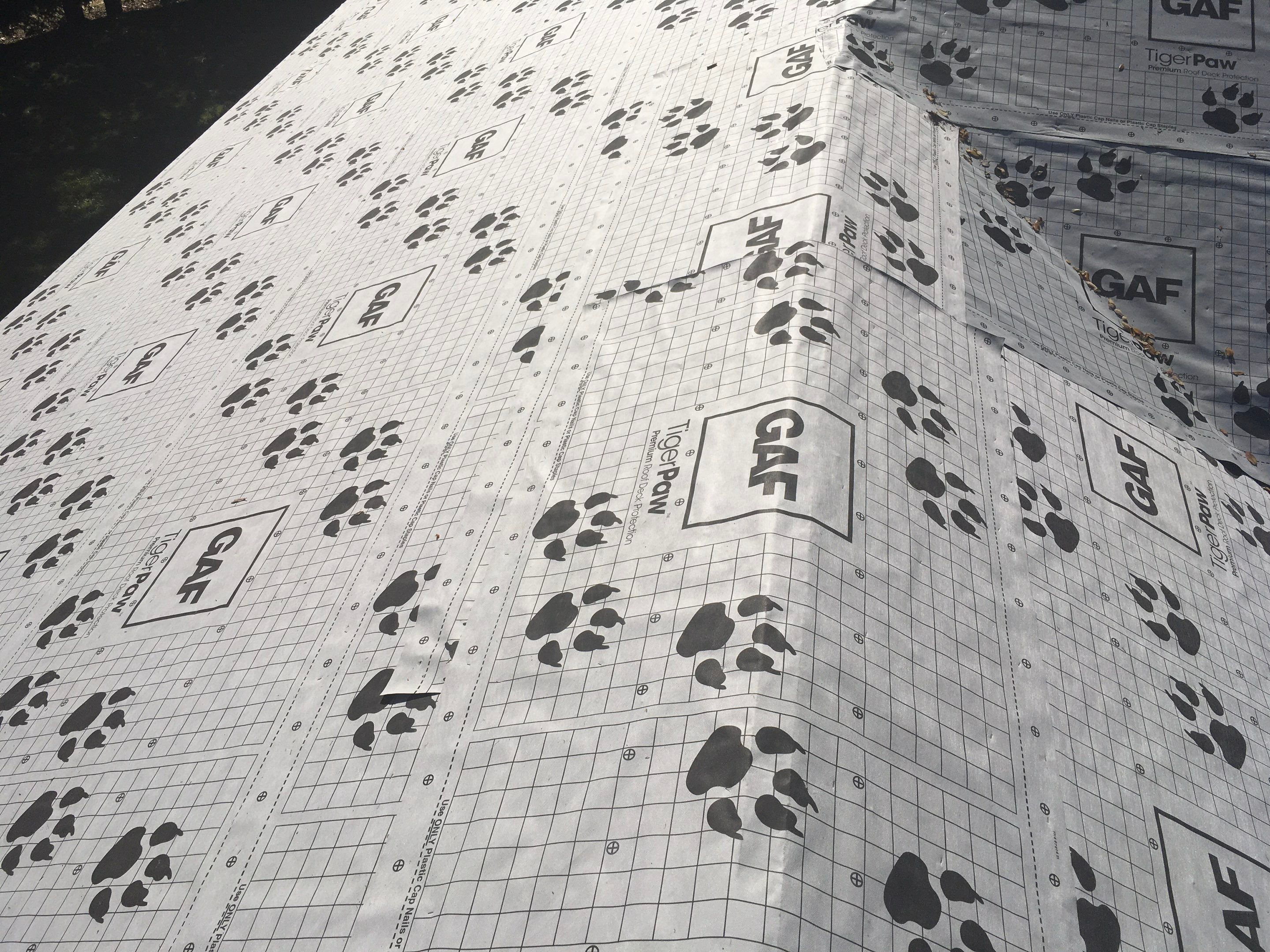 Metal roofing installation using Standing seam metal roofing system by Straight Edge Roofing Inc