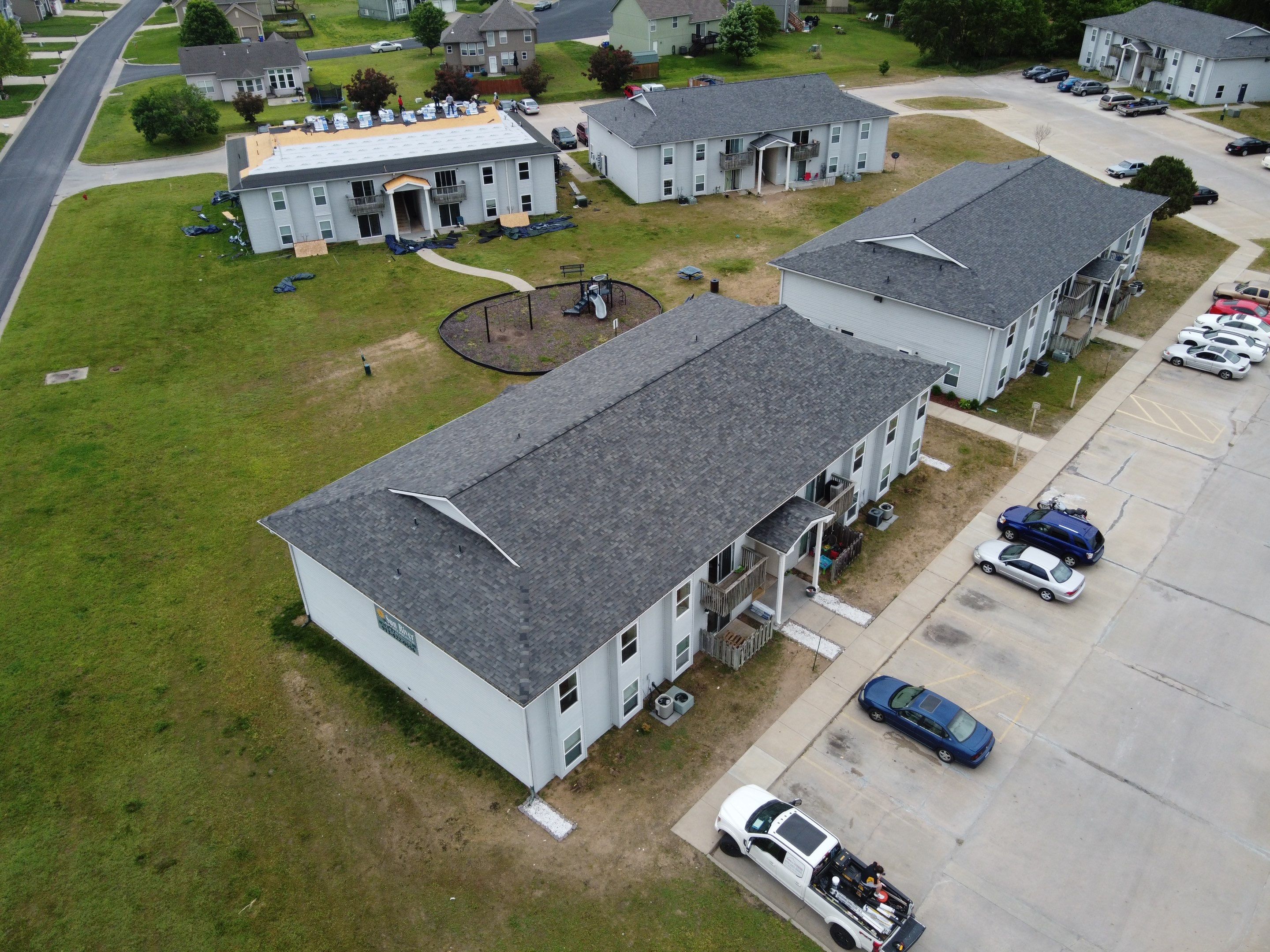 Multifamliy Complex ROOF REPLACEMNT with Ventilation Upgrades using Malarkey Vista Class III IR Shingles by Gorilla Exteriors Contracting, LLC