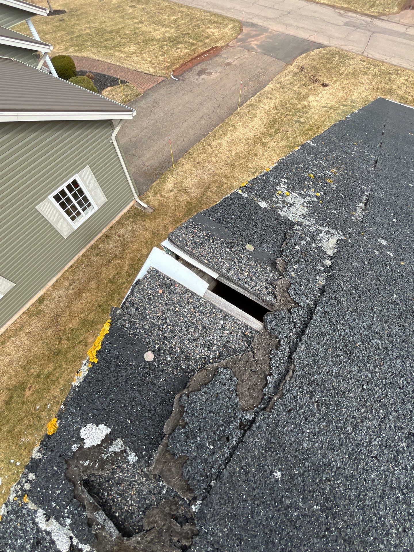 Residential Roofing Installation using Asphalt GAF HDZ in Charcoal by Artisan Roofing & Home Improvements Inc.