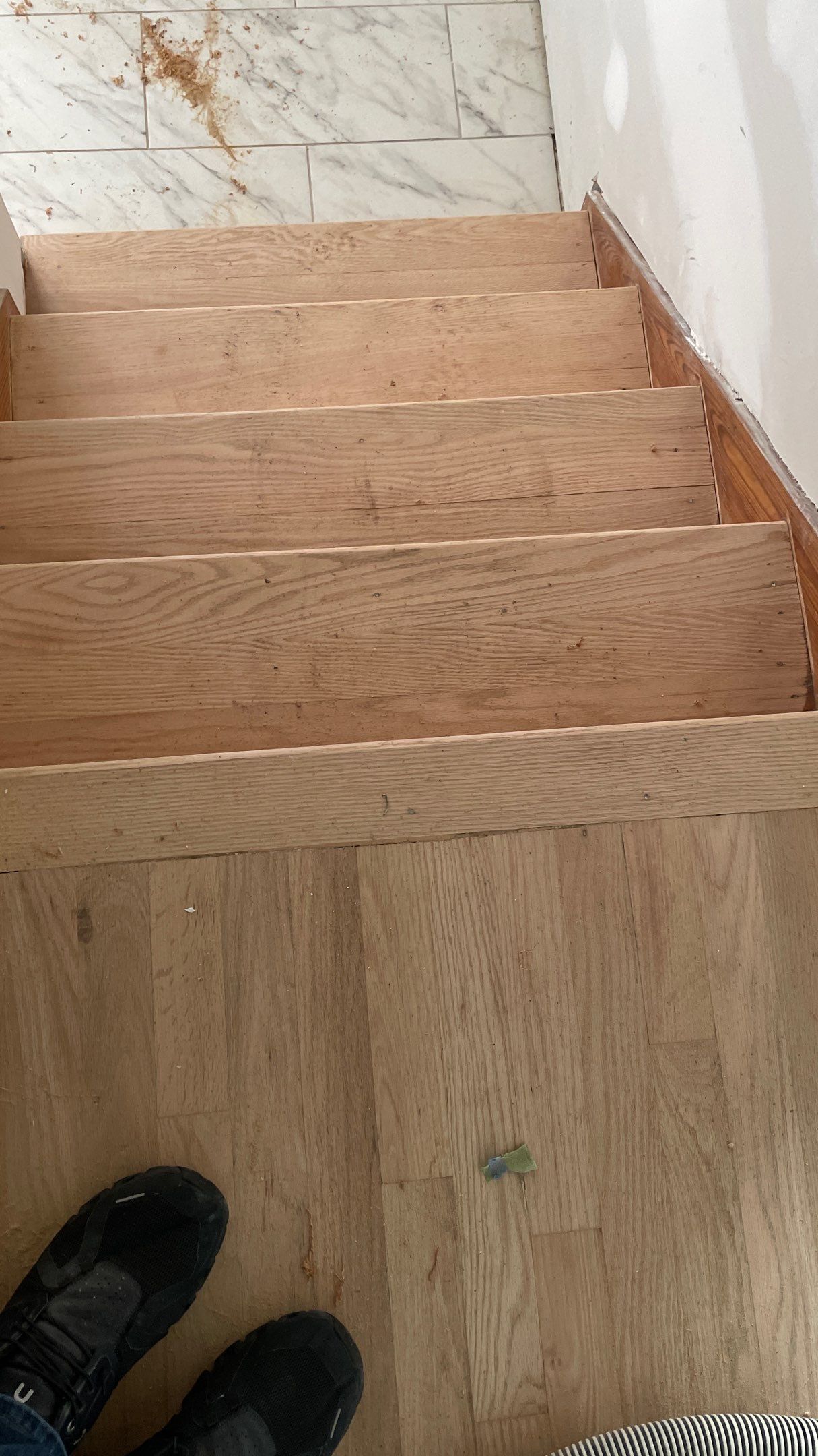 Remodeled Home with new tile floors, Showers and Refinished Oak Floors with stain and Waterbased Finish by Footprints Floors of Coastal Carolina