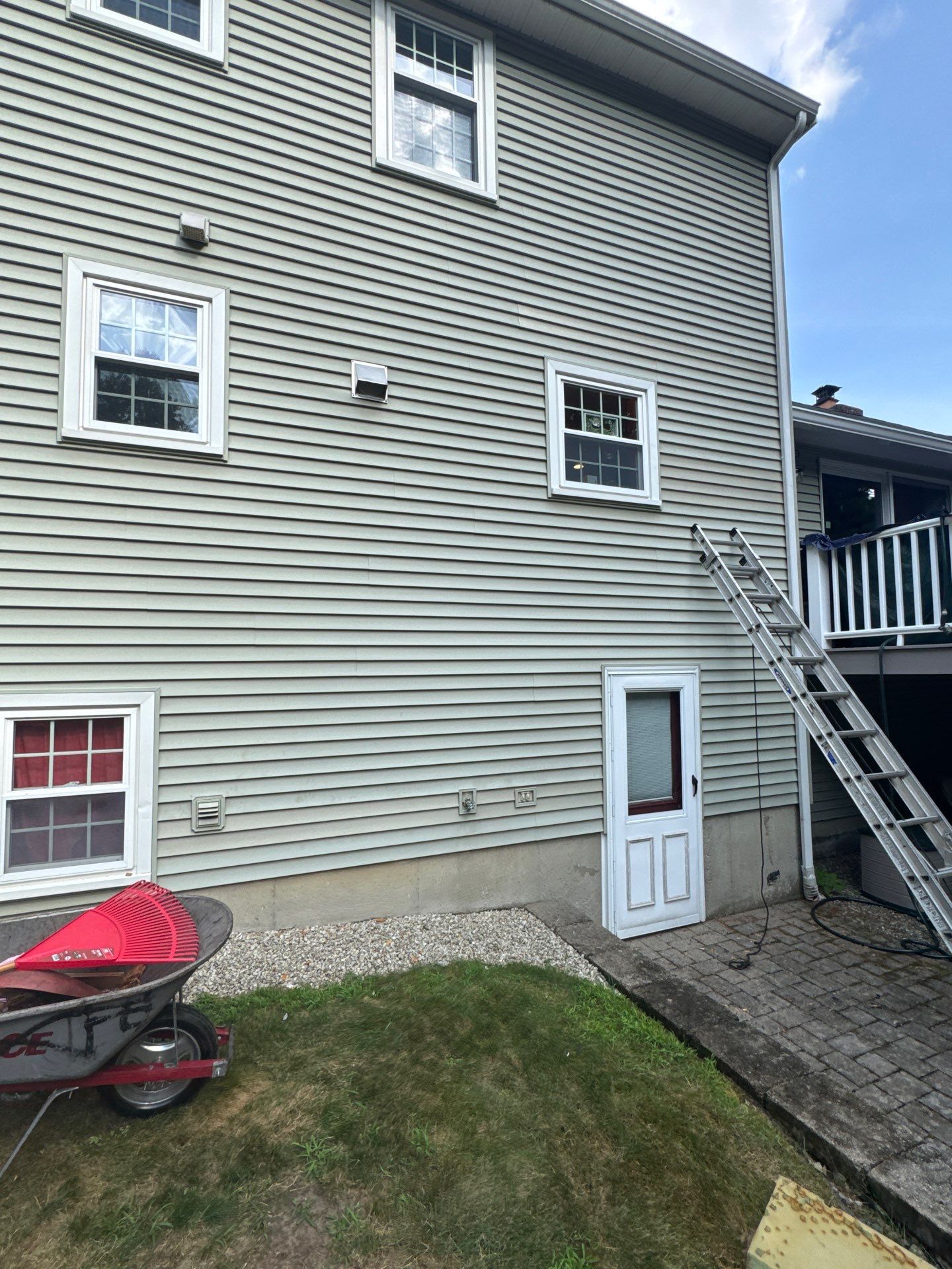 Complete Roof Replacement with Chimney Flashing, Gutter Guard System, and Vinyl Siding Repairs by Mighty Dog Roofing of Greater Middlesex County