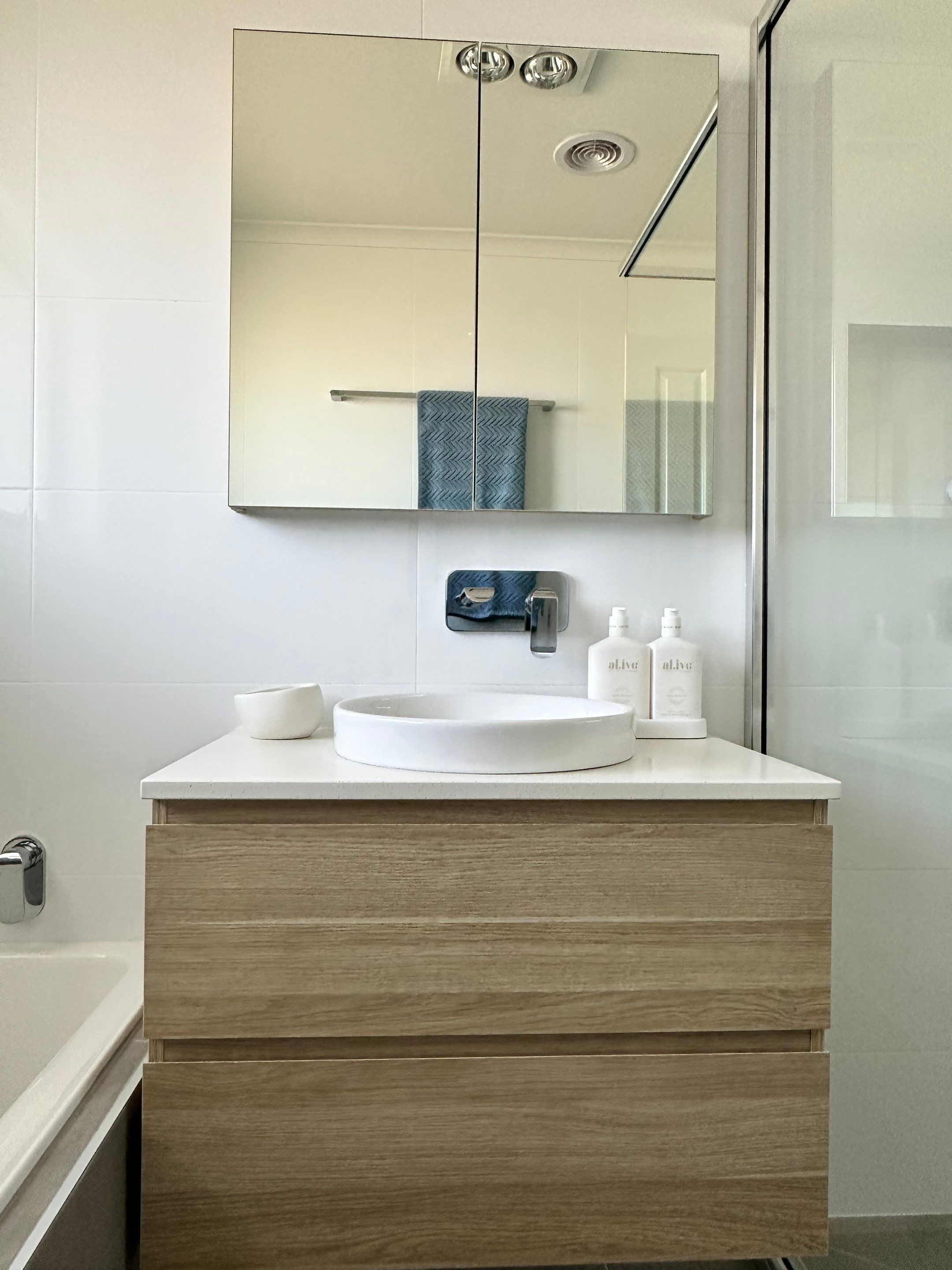 Main Bathroom, Ensuite, Toilet, Powder Room, and Laundry Renovation by Re-seal Bathrooms