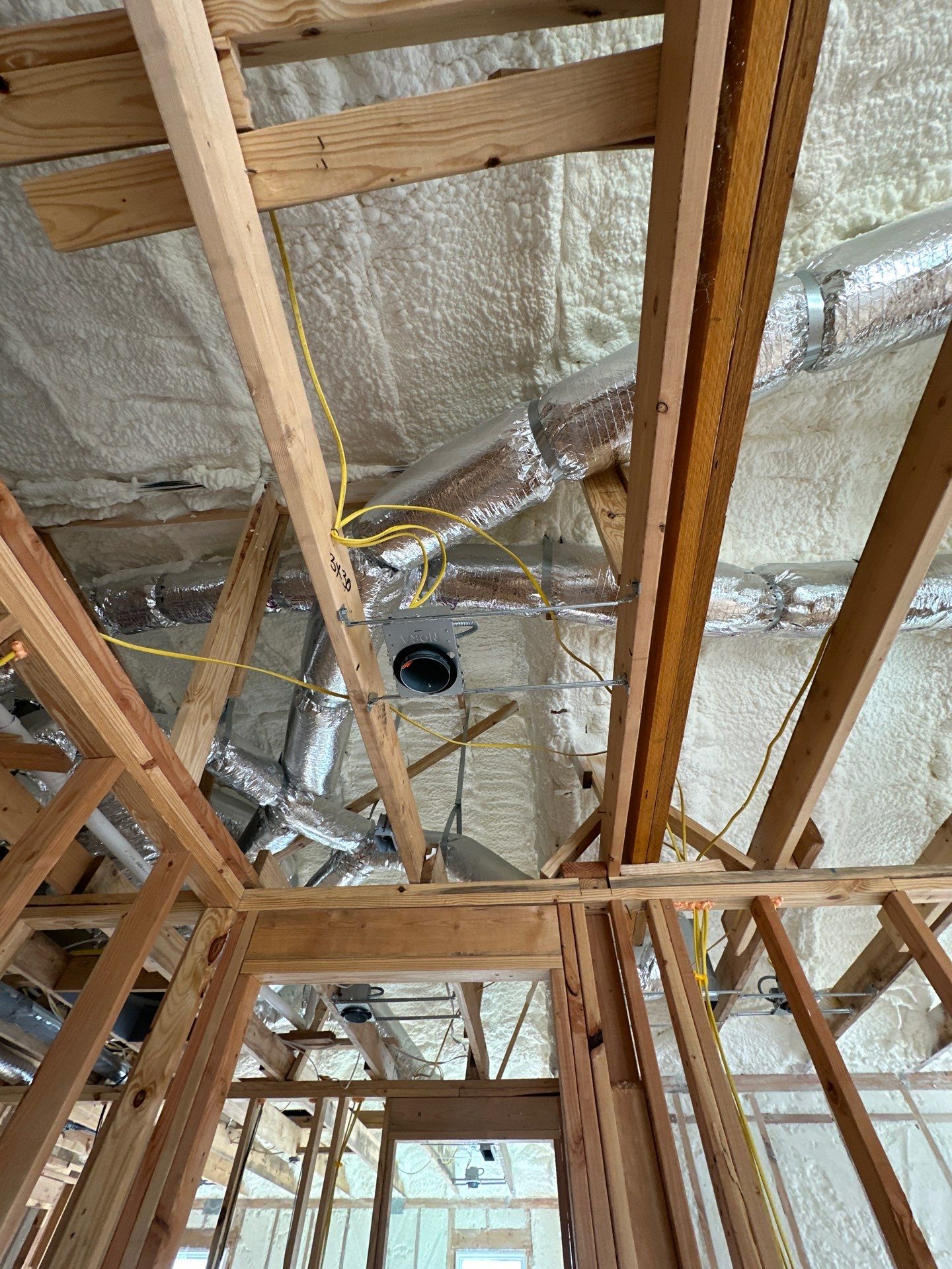 Open cell spray foam job completed at this beautiful custom home in Dallas TX by Apex Insulation Solutions