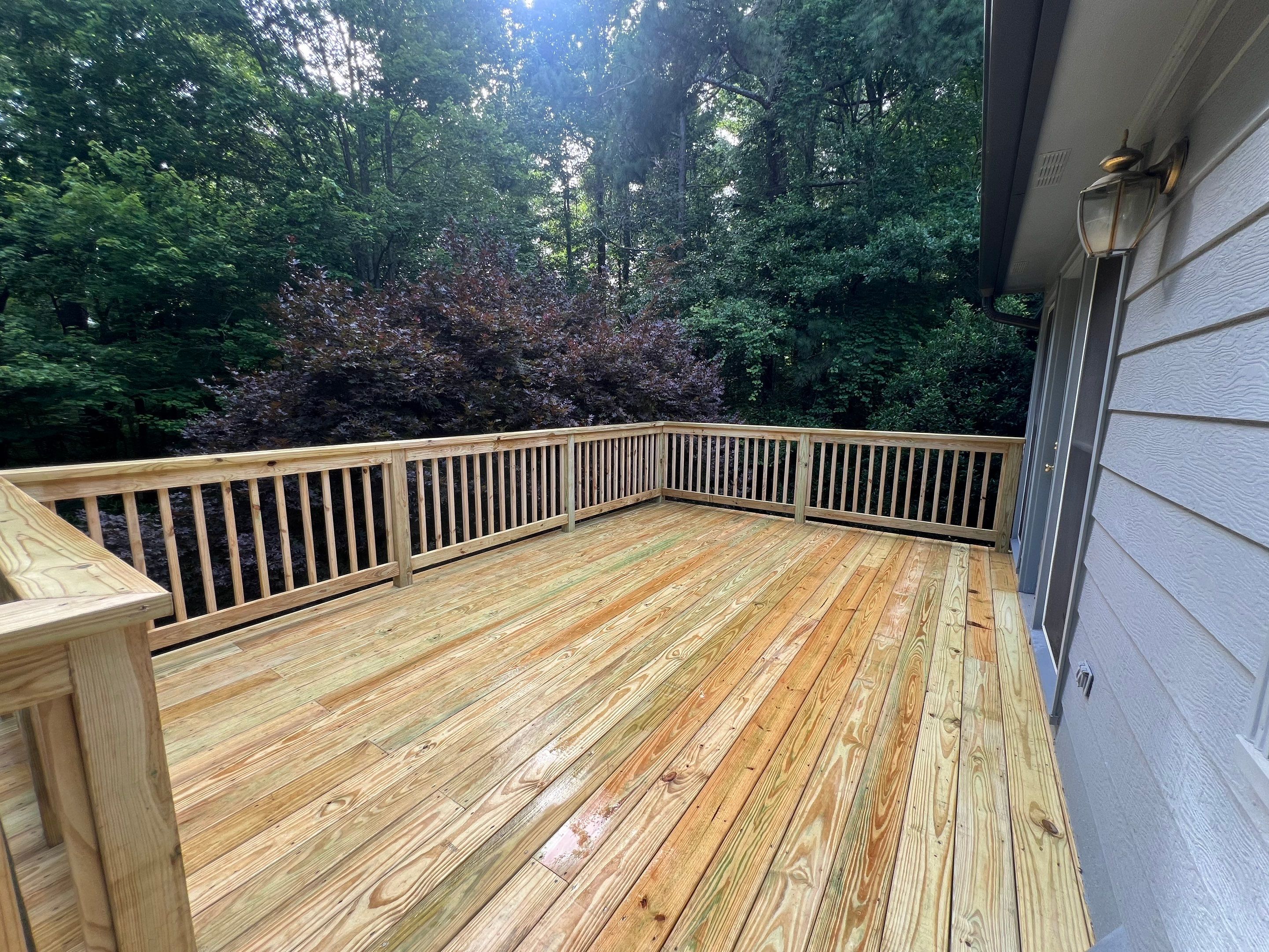 Pressure-Treated Wood Deck Replacement and Staircase Installation in Kennesaw by Swift Home Renovations