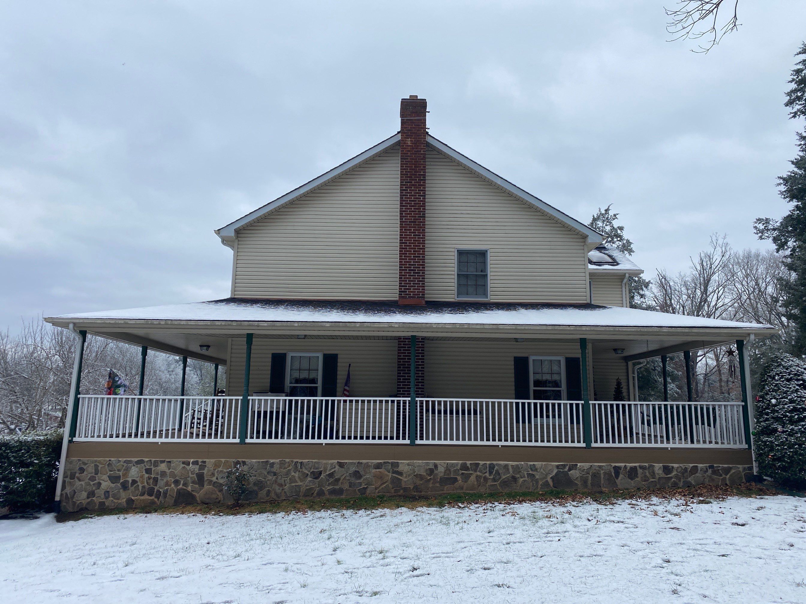 Exterior remodel including window replacement by American Home Contractors