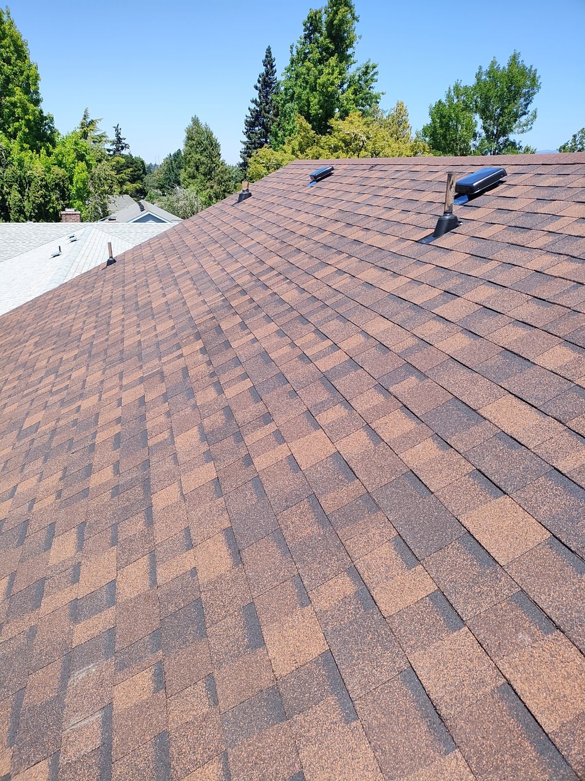 Residential Reroof using Owens Corning Duration Shingles in the color Brownwood. by BEST Roofing & Waterproofing