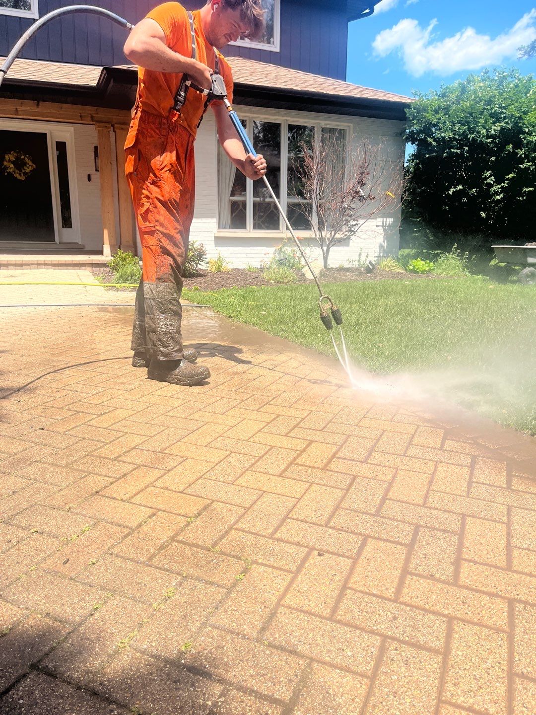 Brick paver repair, cleaning and sealing by Northern Power Washing LLC.