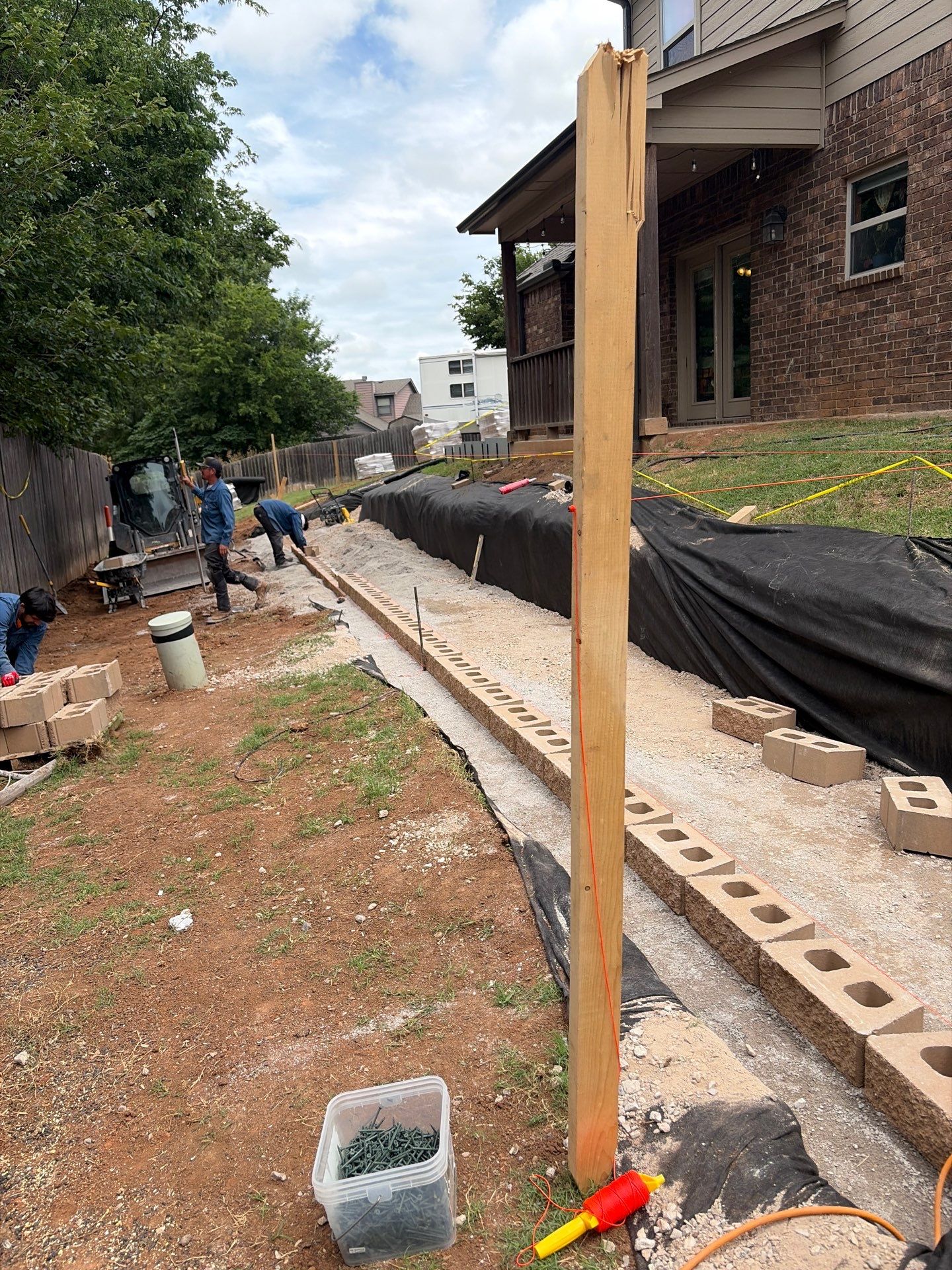 Custom Segmental Block Retaining Wall and Sod Installation in Lawton by Clays Services Inc
