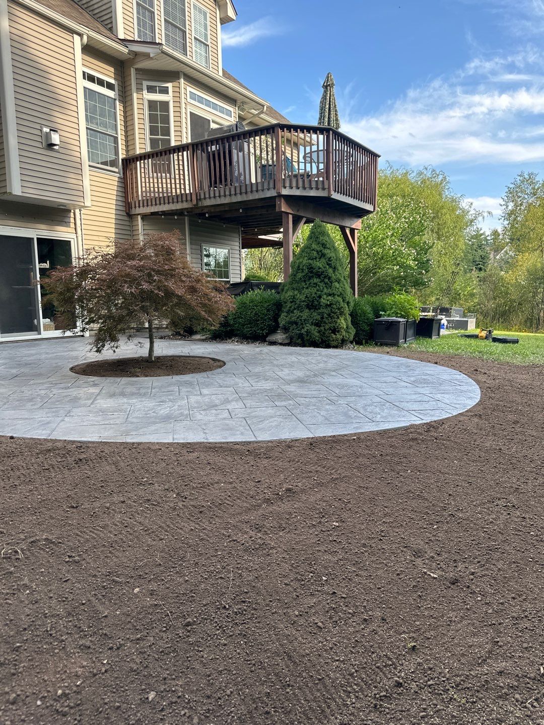 Majestic ashlar stamped concrete patio  by NG Masonry & Construction LLC