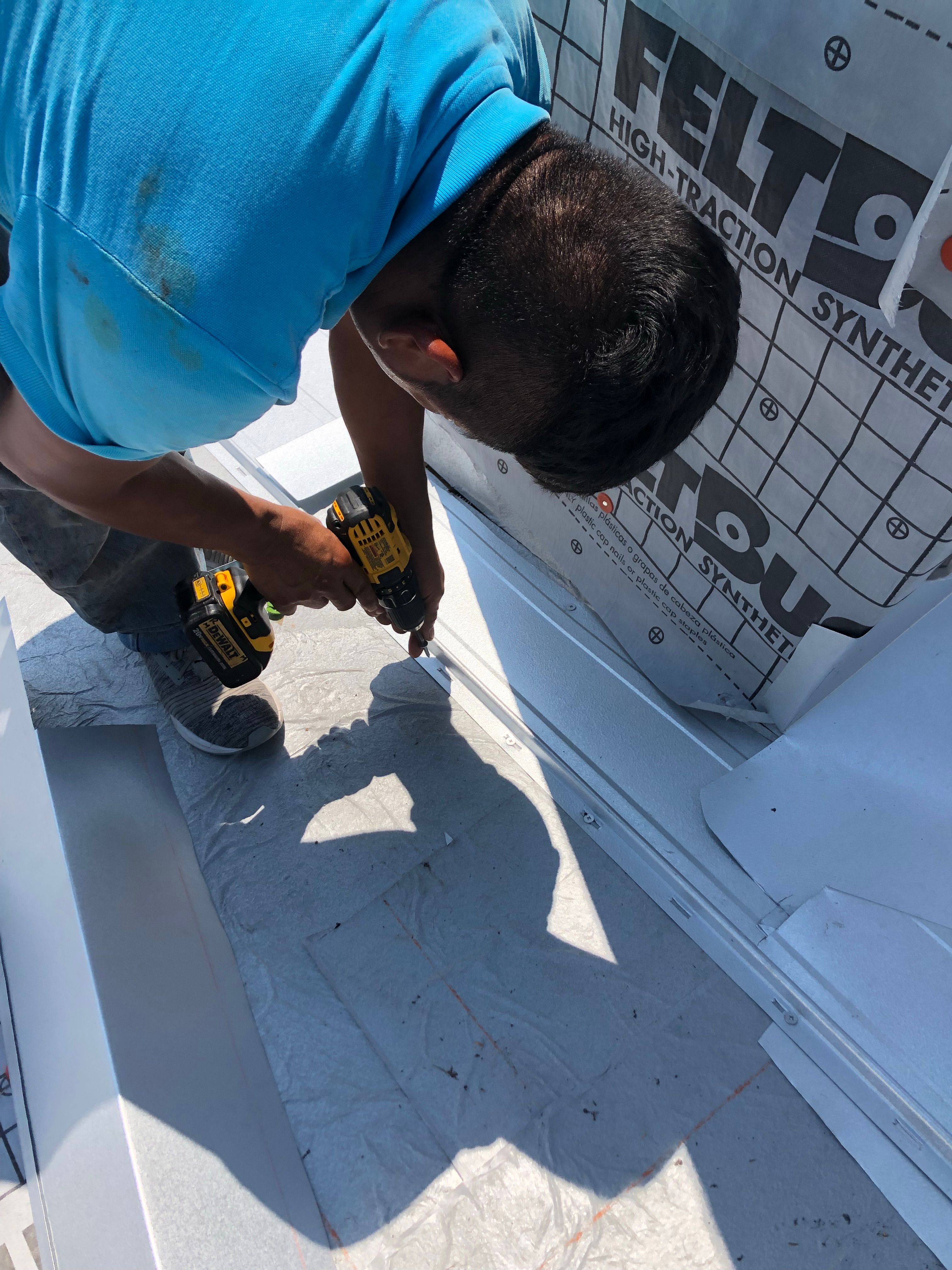 Residential Roofing Installation using Metal roofing by American Roofing & Construction LLC