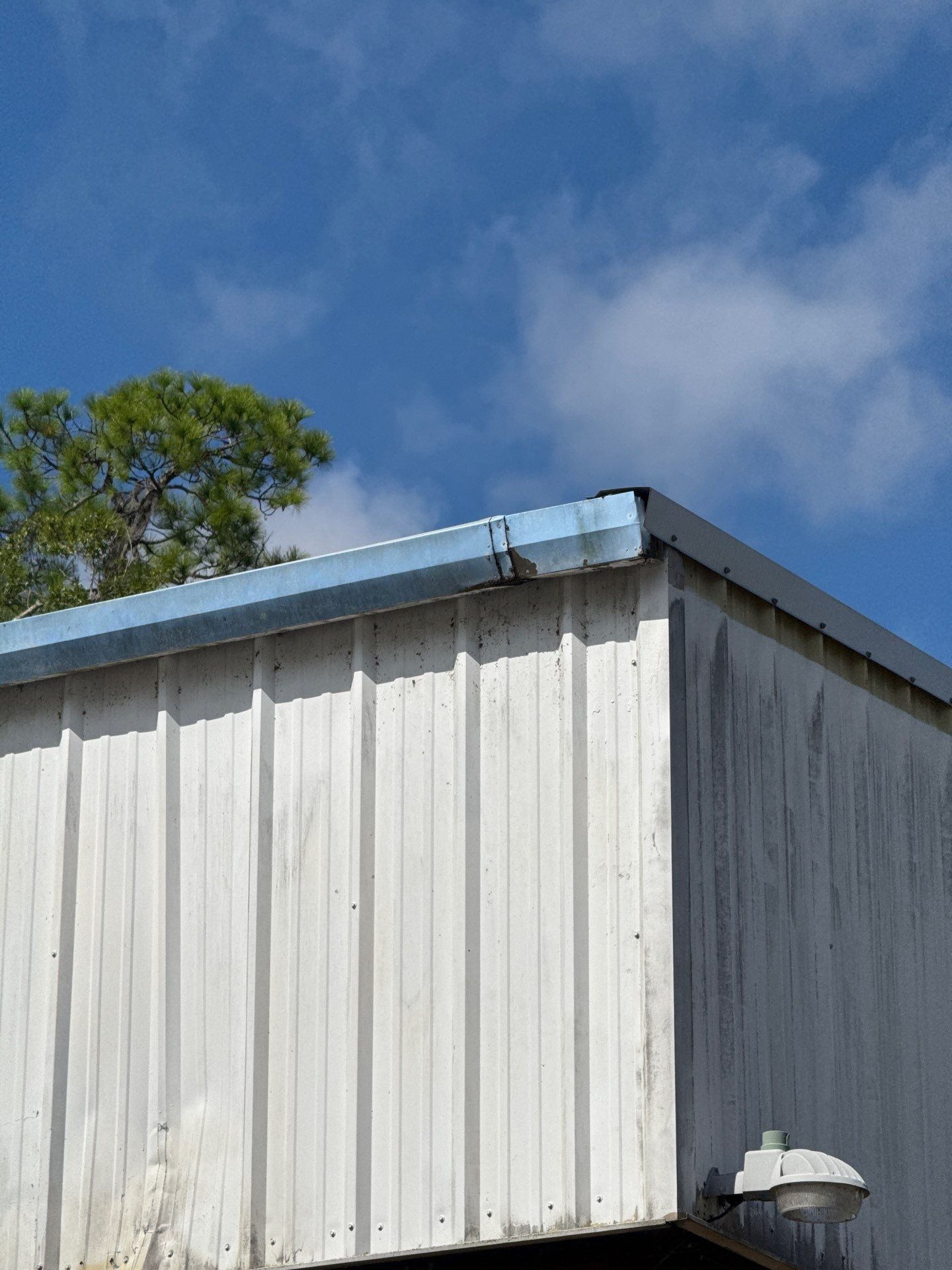 Clean Gutters and Seal Seams in Lakeland FL by Gutter Professors