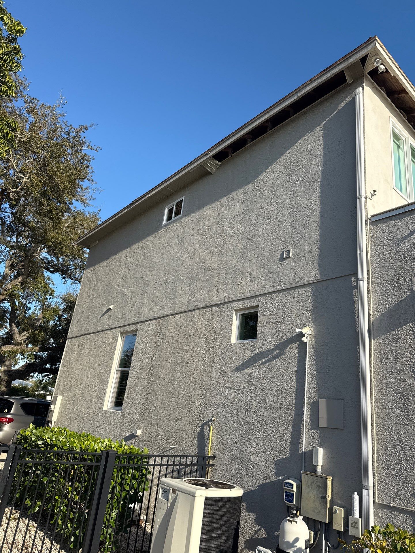 Soffit and Fascia Installation and black seamless gutters in Sarasota FL by Gutter Professors