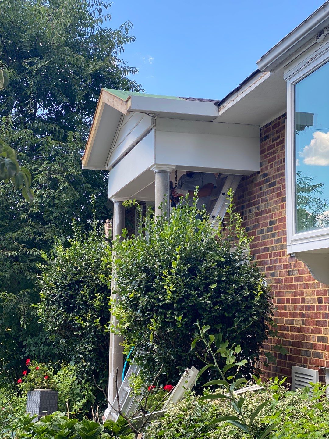 porch  using Brick pavers, porch columms , rooff update   by Jesus Master Handyman LLC 