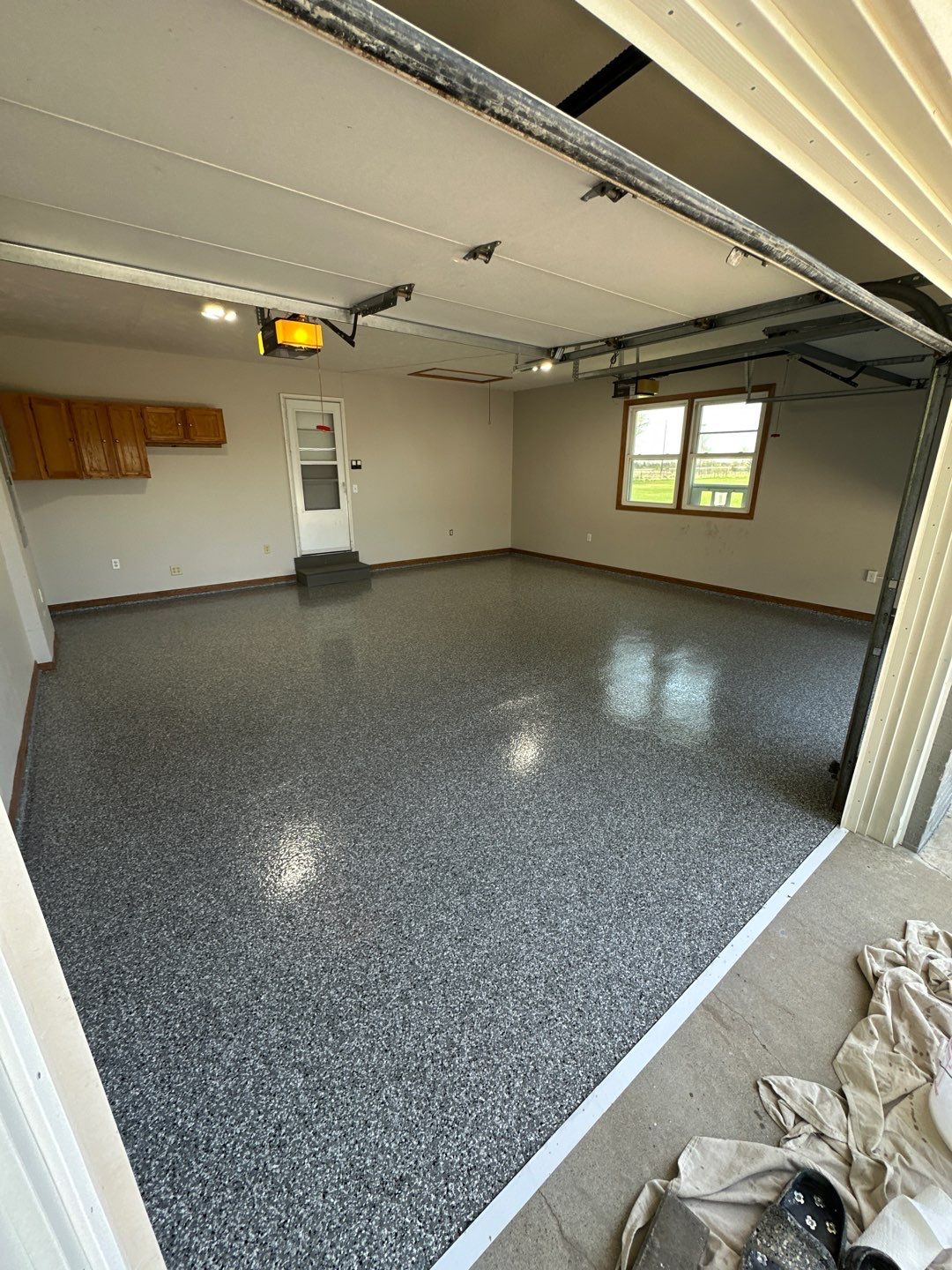 Epoxy Garage Floor Transformation and Concrete Repair in Beatrice by Goat Coatings