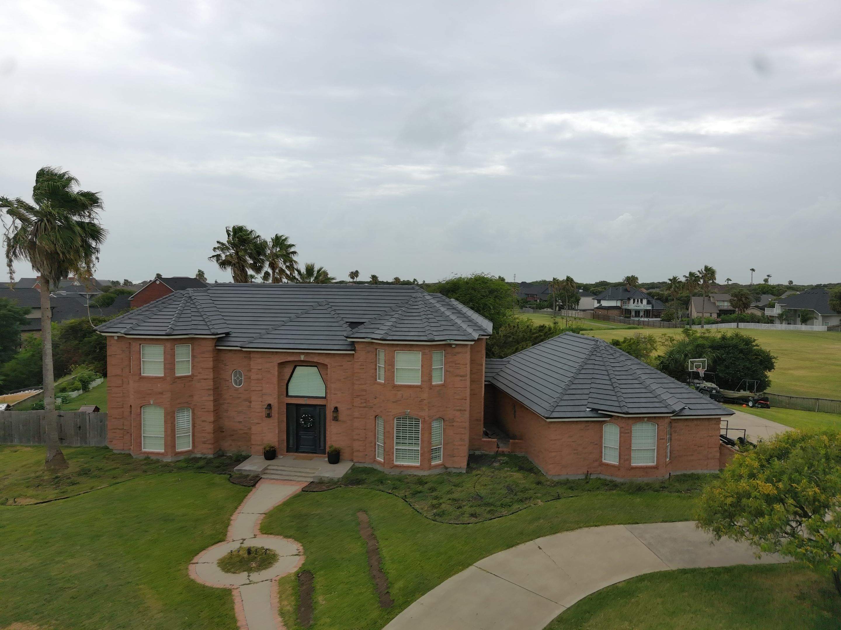 Golf-Proof Tile Roof by Bayfront Roofing and Construction