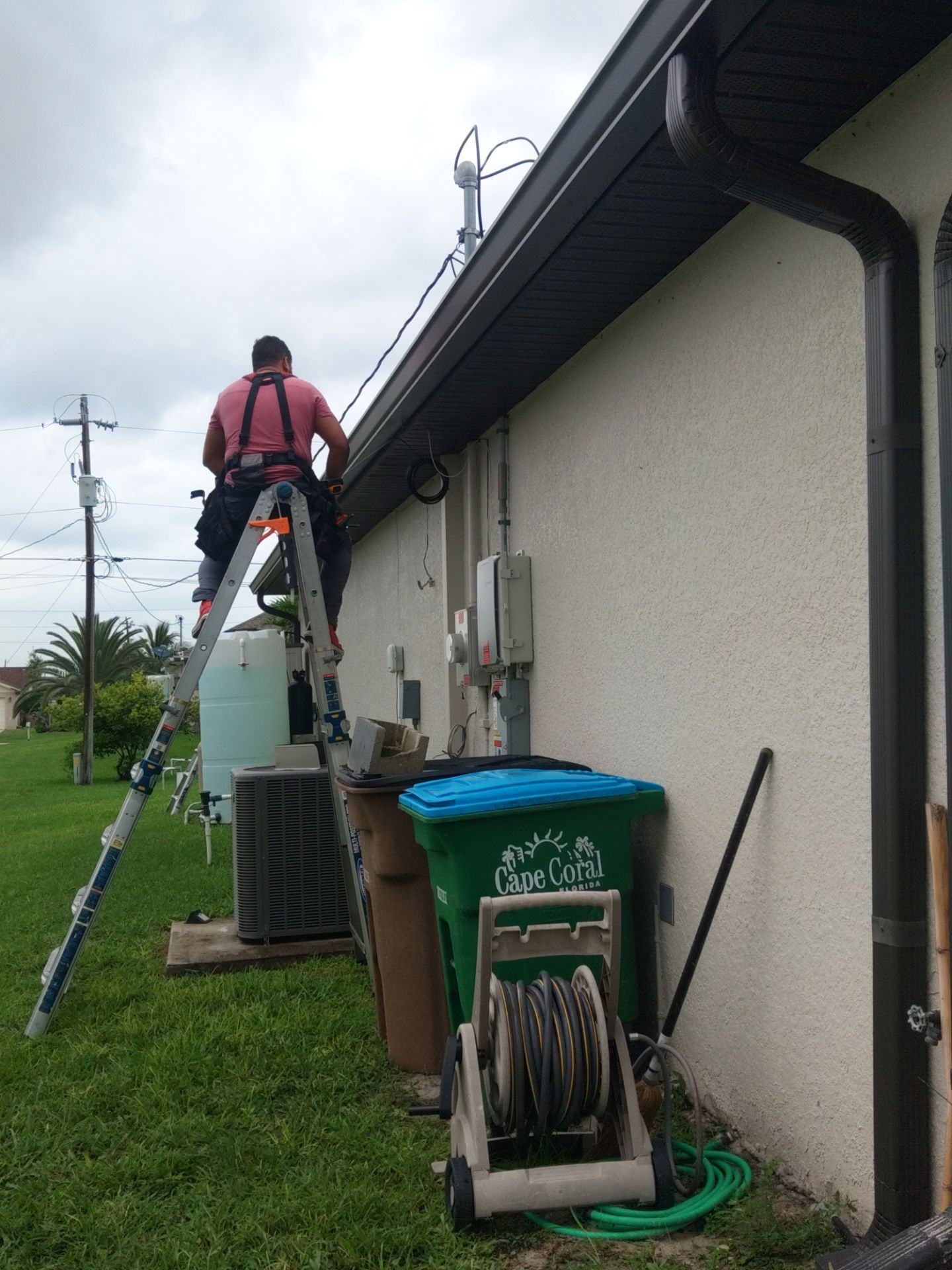 Black Seamless Gutters using black seamless gutters in Cape Coral FL by Gutter Professors