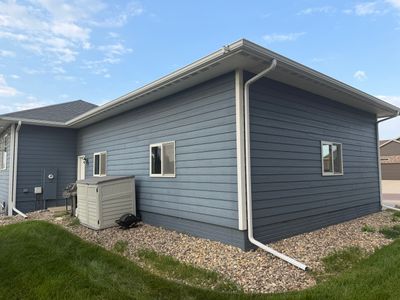Sioux Falls Exterior Residential Siding and Deck Painting Project