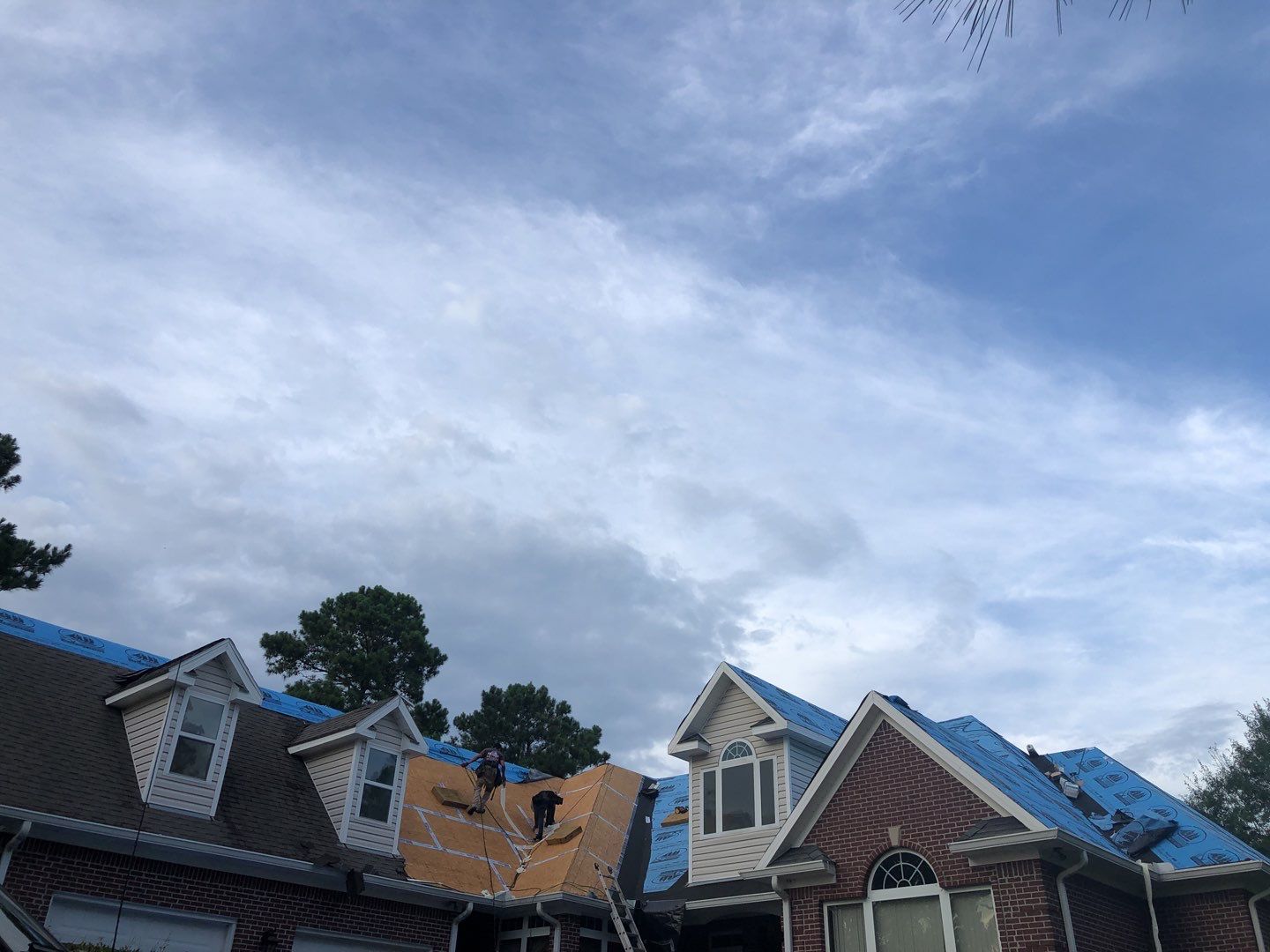 Residential Roofing Installation using Roof Replacement by American Roofing & Construction LLC