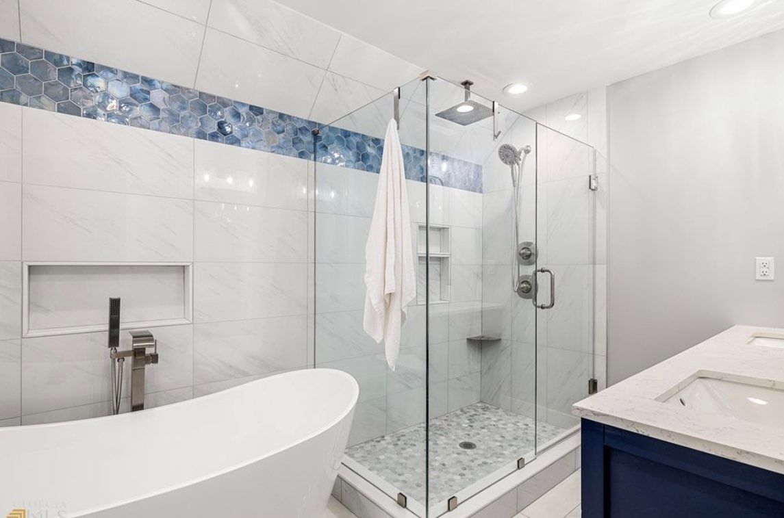 New Construction Bathrooms and Fireplace by Footprints Floors of East Atlanta