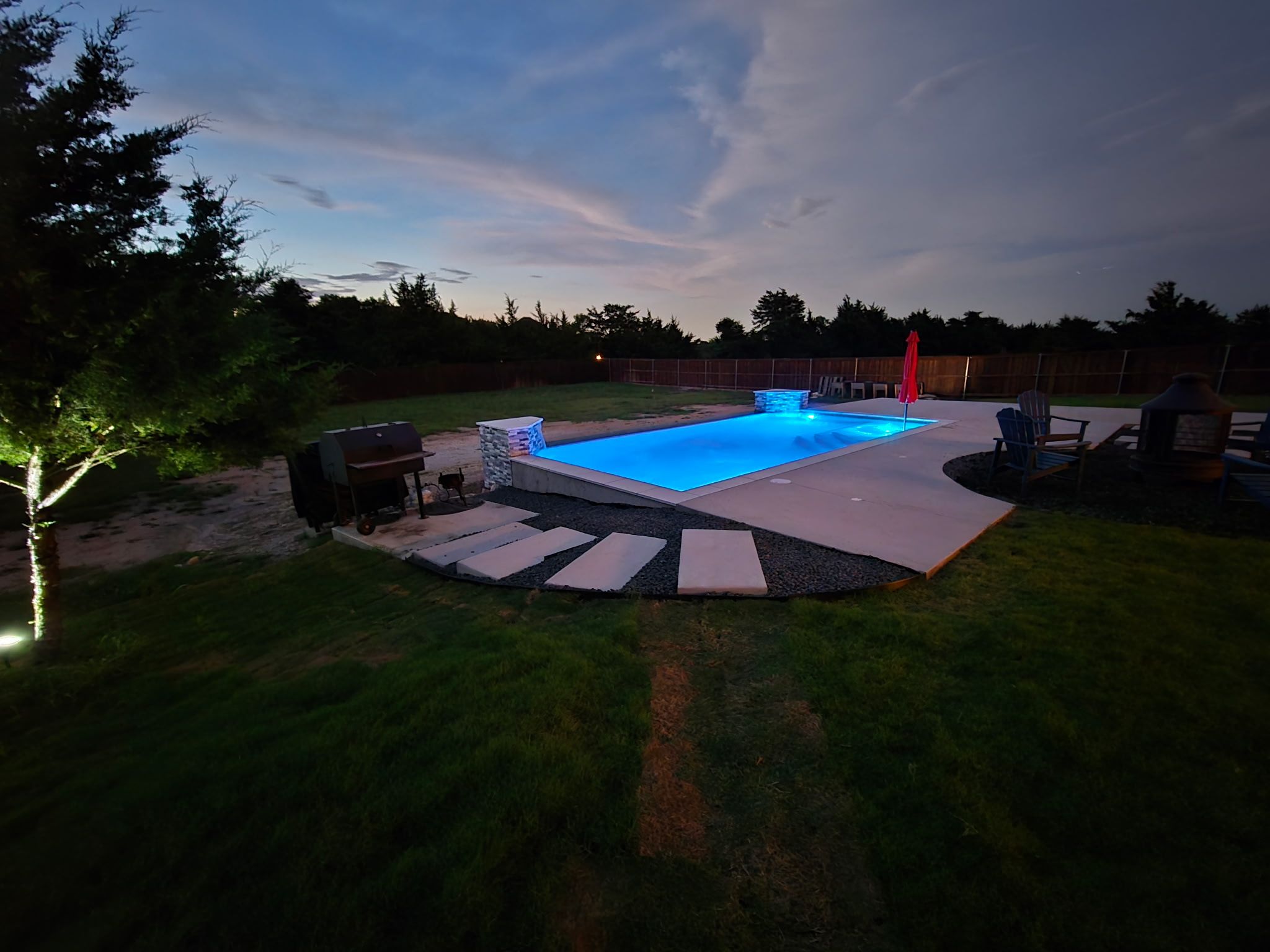 Modern Rectangular Pool with Sheer Waterfall by Pinnacle Pools and Spas - DFW