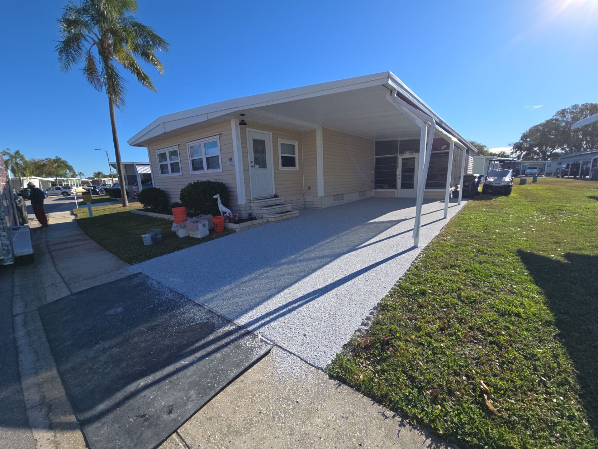 Largo, FL Driveway Concrete Coating by Performance Floors & Coating