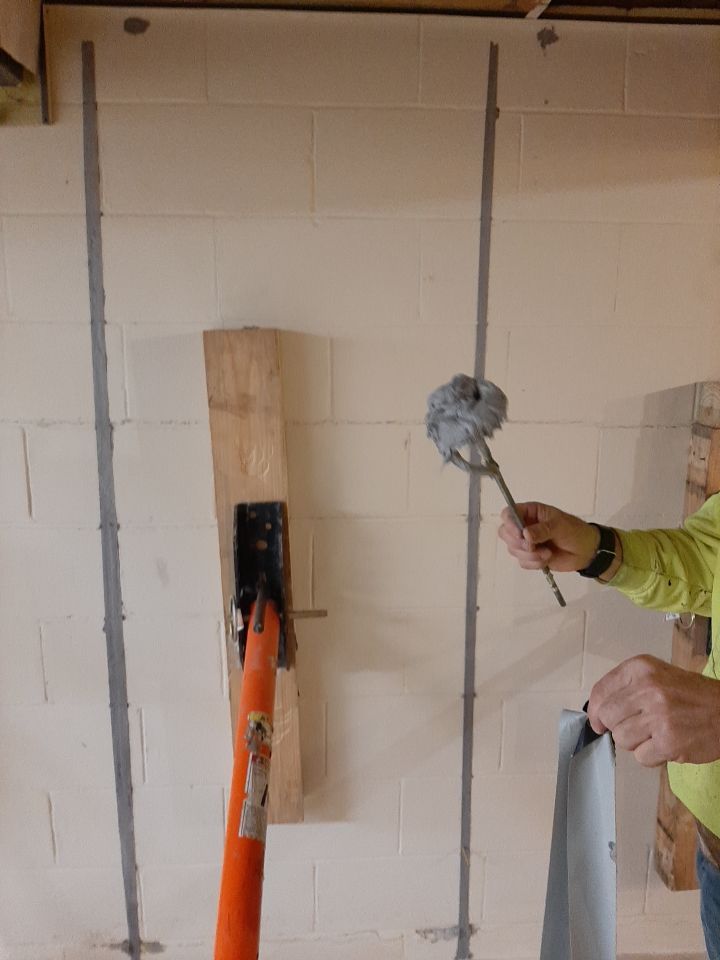 Wall Straightening and Reinforcement using Embedded Fiber Reinforcement by Toledo Basement Repair 