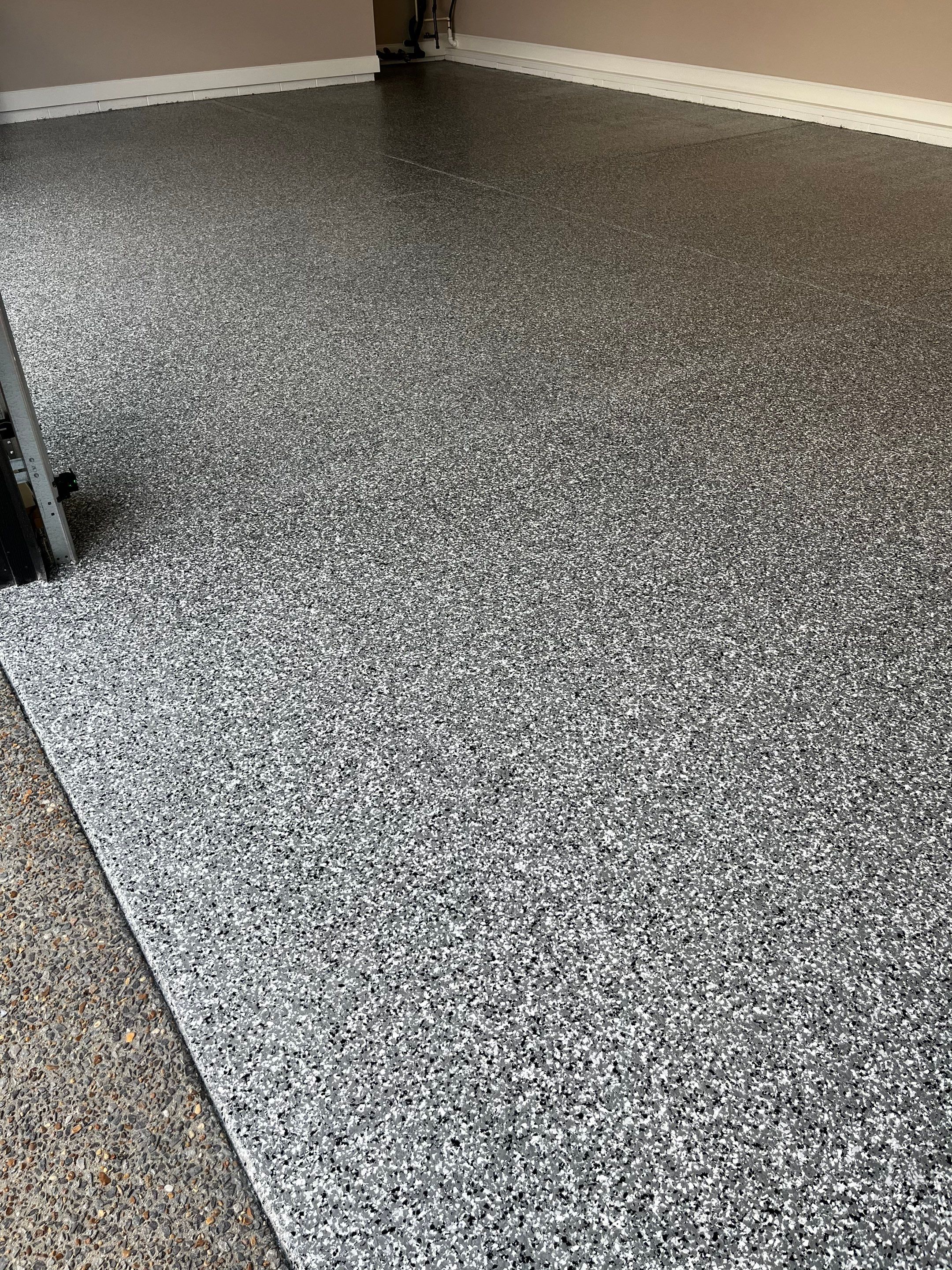 Garage Floor Coating using Wombat by My Garage Floor Guys