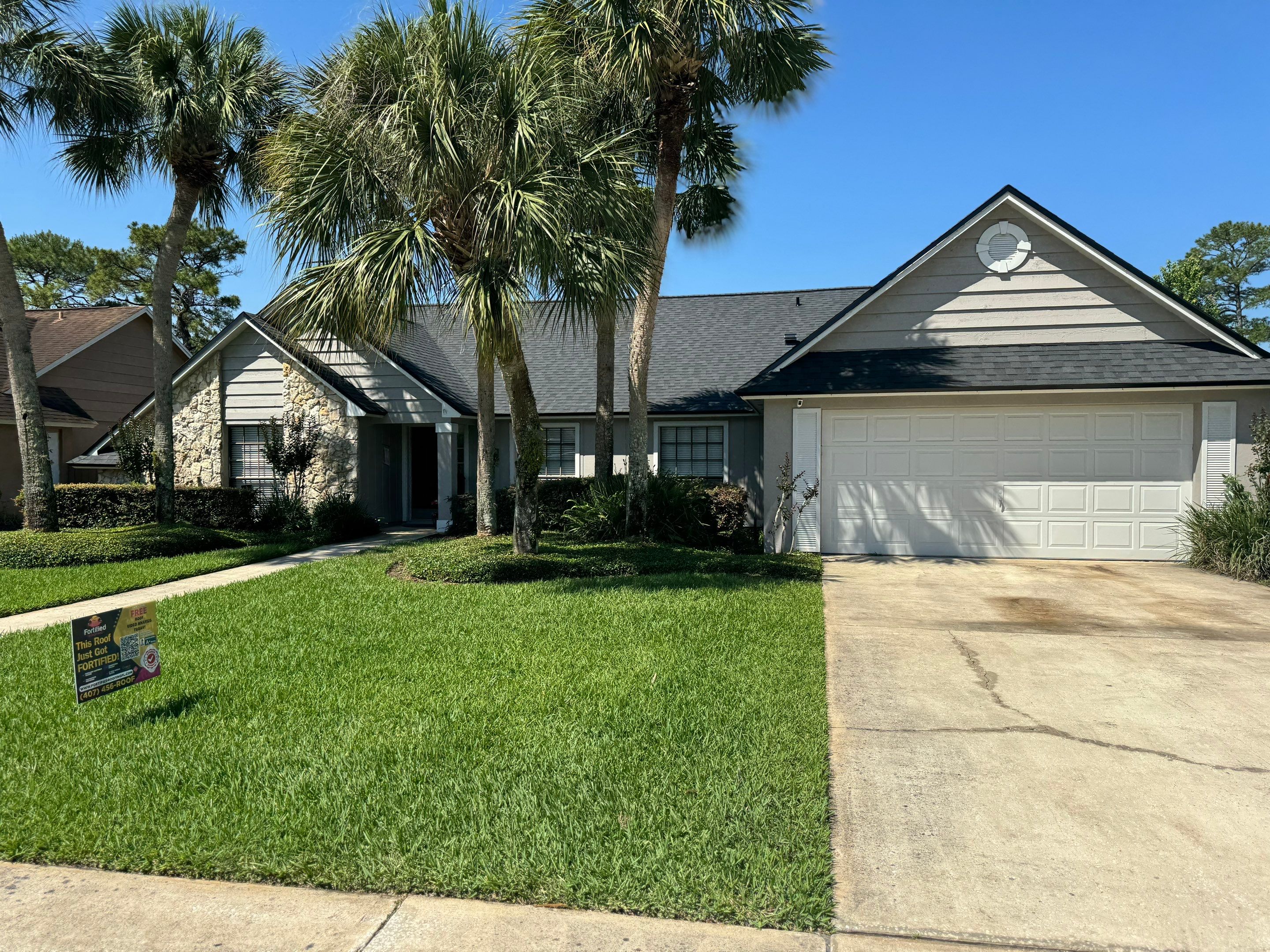Asphalt Architectural Shingle Roof Replacement and Solar Integration in Longwood by Fortified Roofing Solutions Corp.