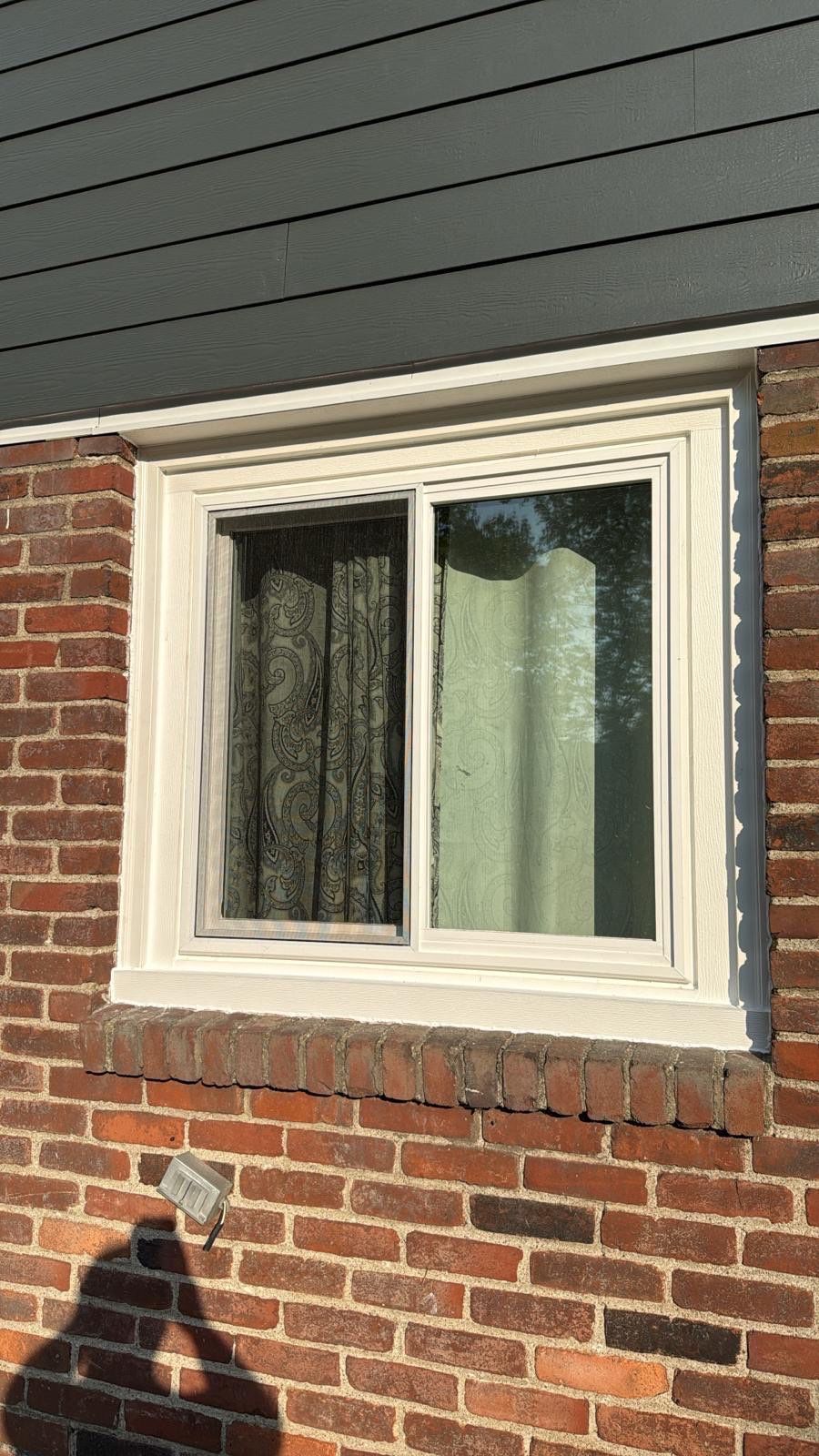 Hardie Siding and Window Project in Bridgeville by Cousins Roofing Siding & Decks