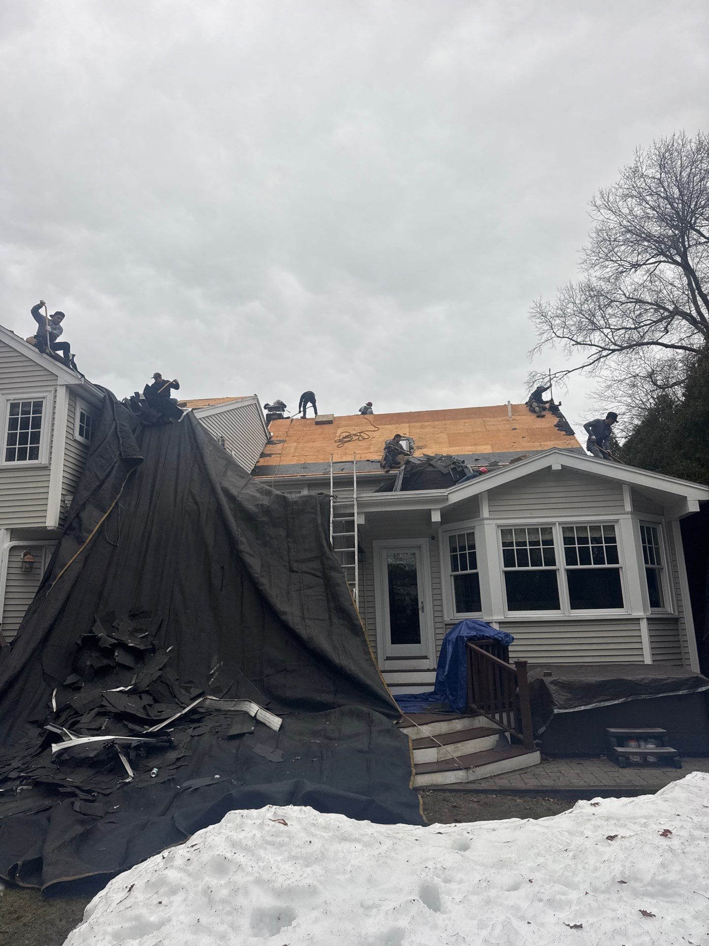 lFull Roof Replacement + Emergency Ice Dam Removal — Lexington, MA by Mighty Dog Roofing of Greater Middlesex County