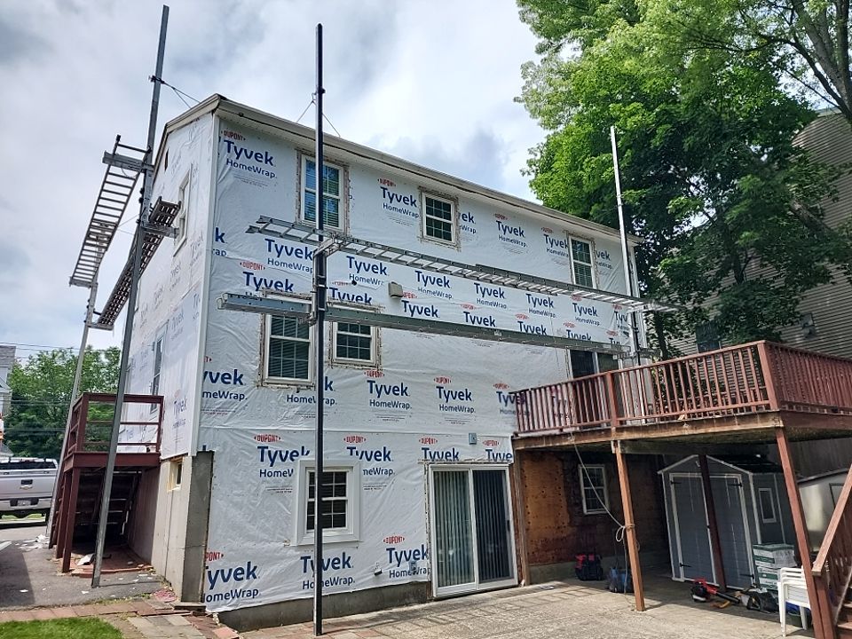 Deck and siding in newton, MA by UBrothers Construction