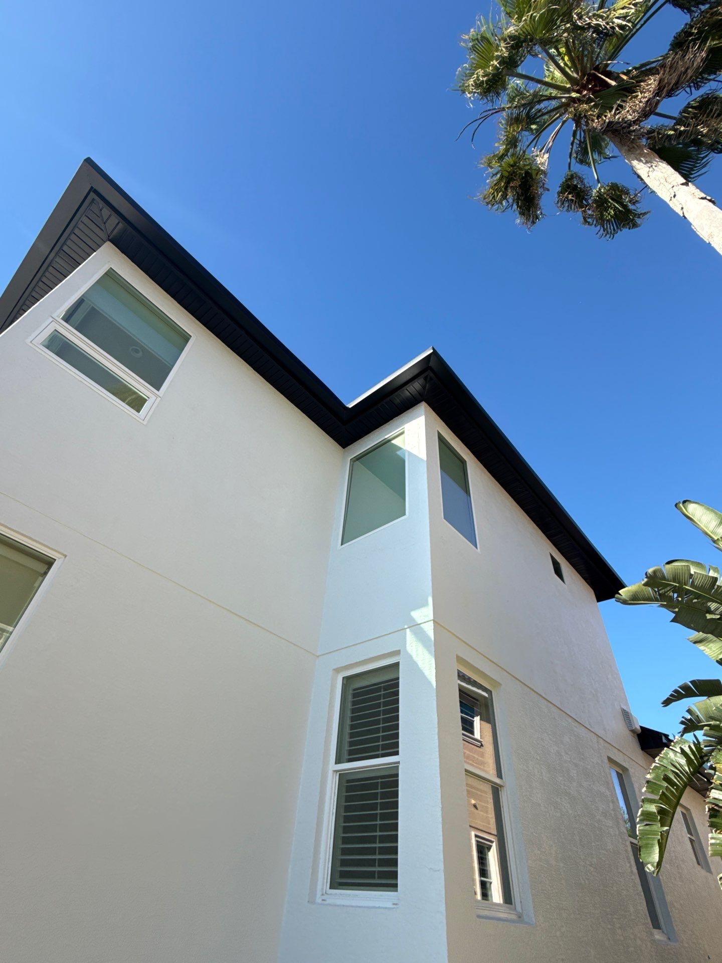 Soffit and Fascia Installation and black seamless gutters in Sarasota FL by Gutter Professors