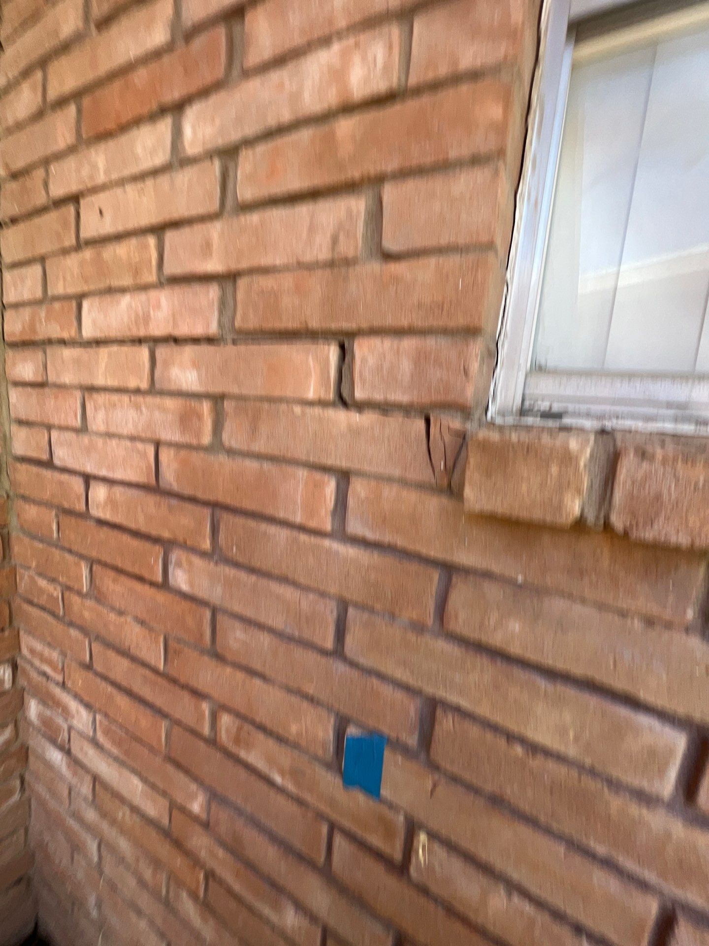 Windows in Brick with a Bay Window by Bayfront Roofing and Construction