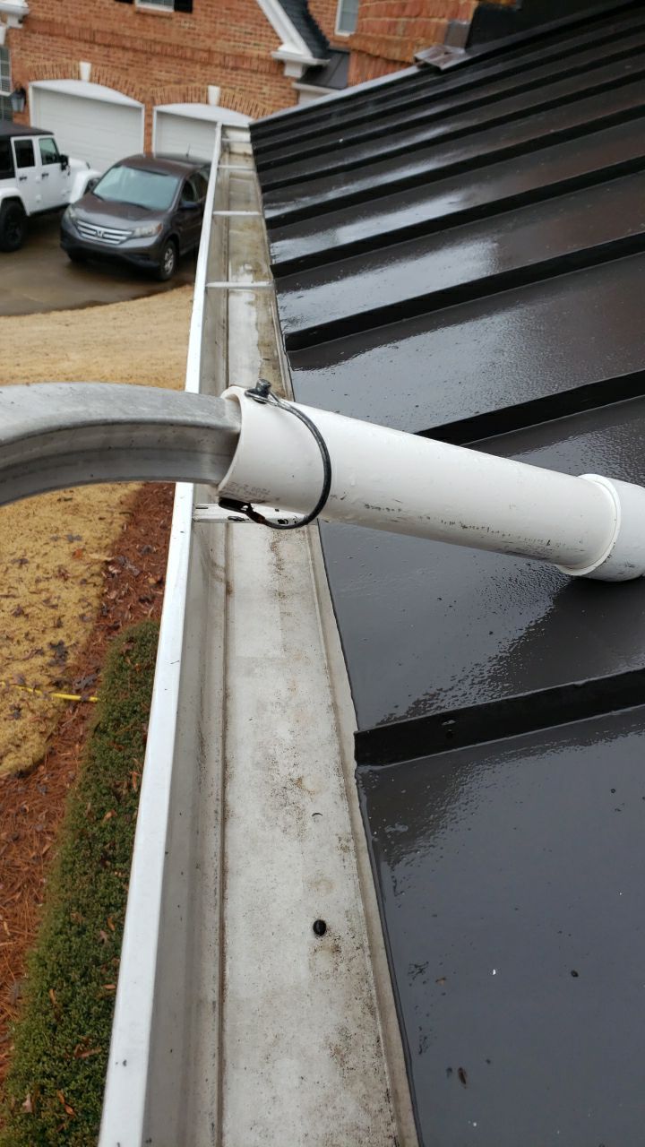 Gutter Cleaning using water by Power Wash Masters LLC