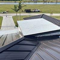 24ga 1.5" Mechanical Seam Dark Bronze by Total Roofing System The Metal Roof Experts