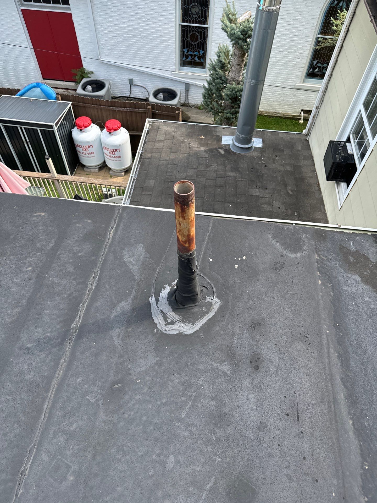 Textured Bronze Roof and Flat Membrane Installation in Hershey by Esh Builders