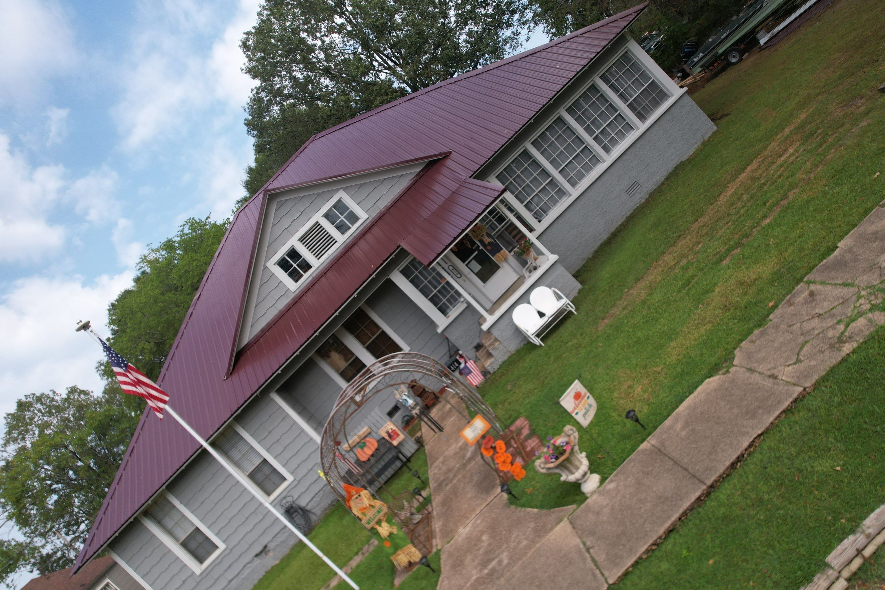 Residential Metal Roof Replacement using Reed's Metals: Colored Residental Panel (Burgundy) by Hostetler Roofing
