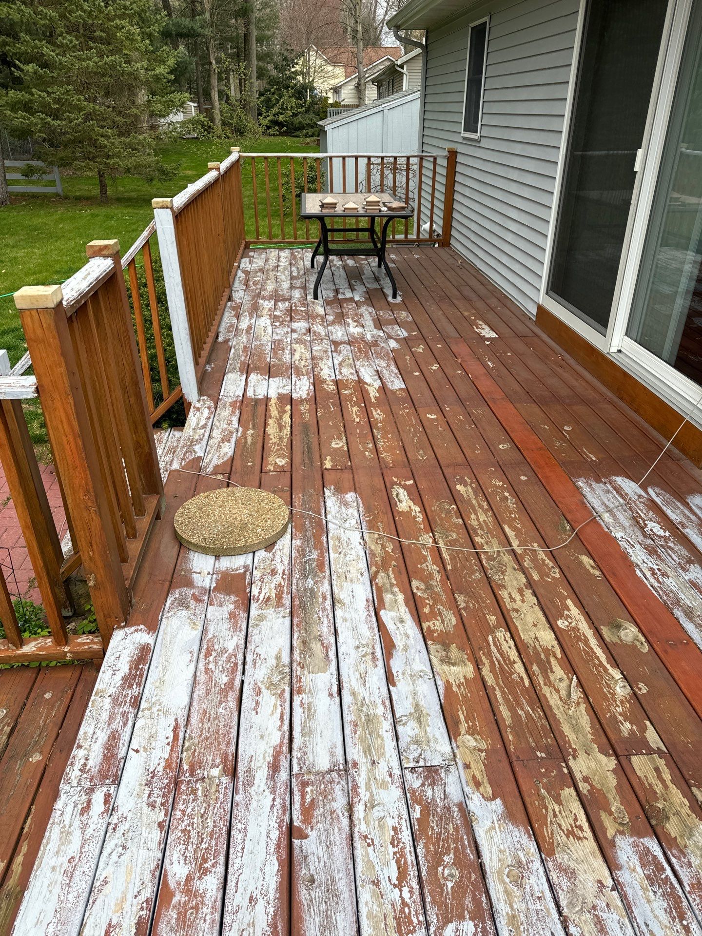 Repaint bedroom furniture, Pergola, and doors. Stain decking by Gordon Painting