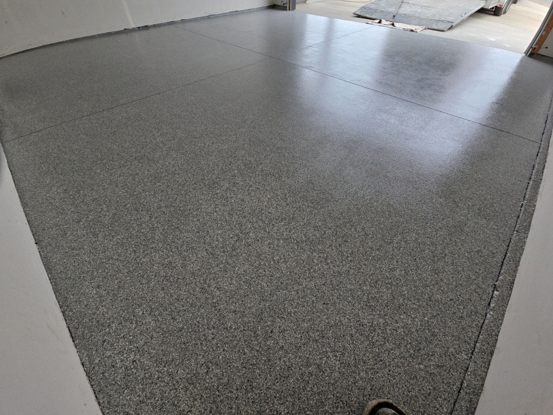 Garage Transformation using Trail Mix 1/8" Chip by Croc Coatings, LLC