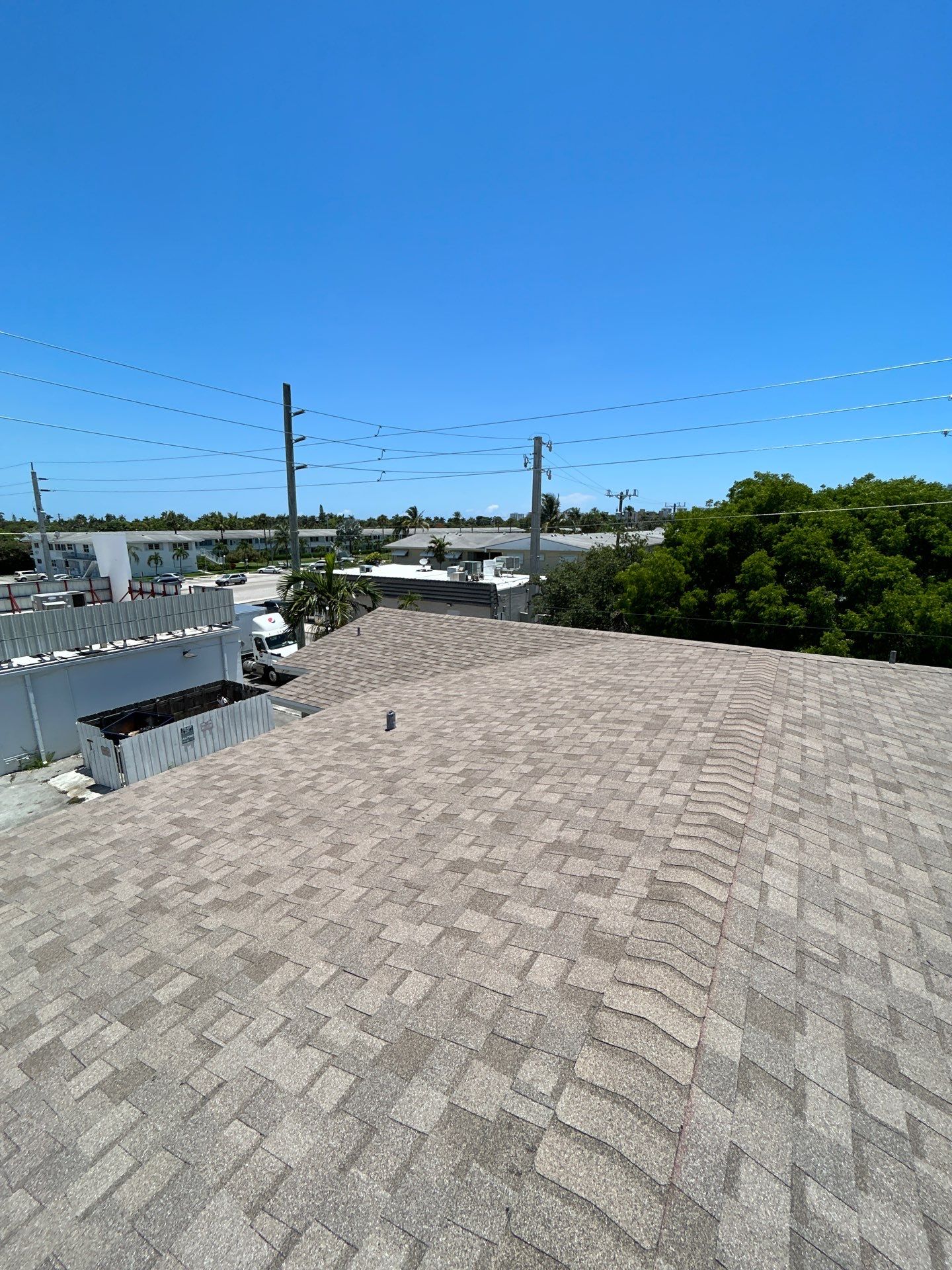 Commercial Roofing Installation using CERTAINTEED LANDMARK AR (SUNRISE CEDAR) by Earl W. Johnston Roofing 